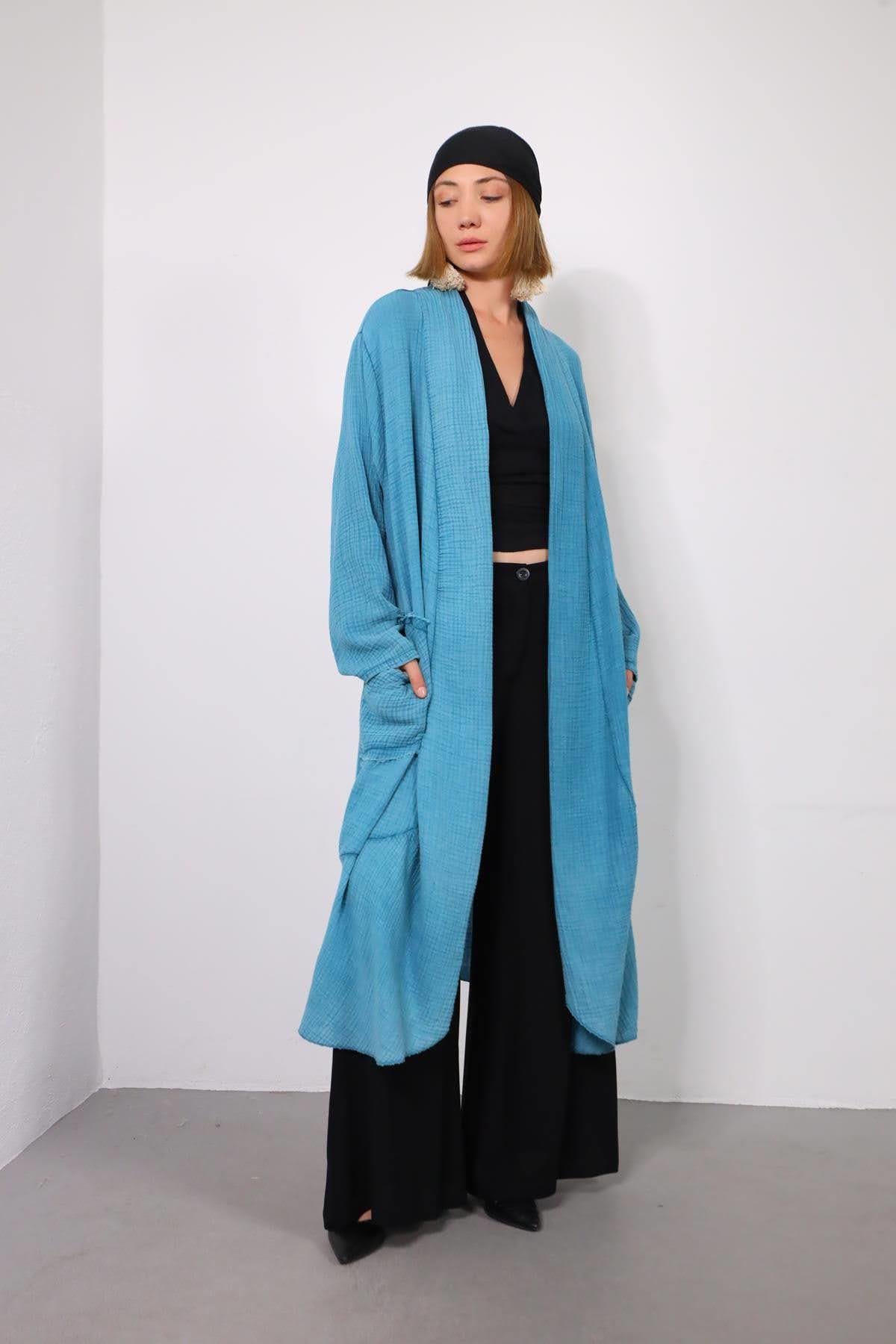 Açık Mavi Cebi Püskül Detaylı Yıkama Müslin Kaftan - Şaman Butik Açık Mavi Cebi Püskül Detaylı Yıkama Müslin Kaftan