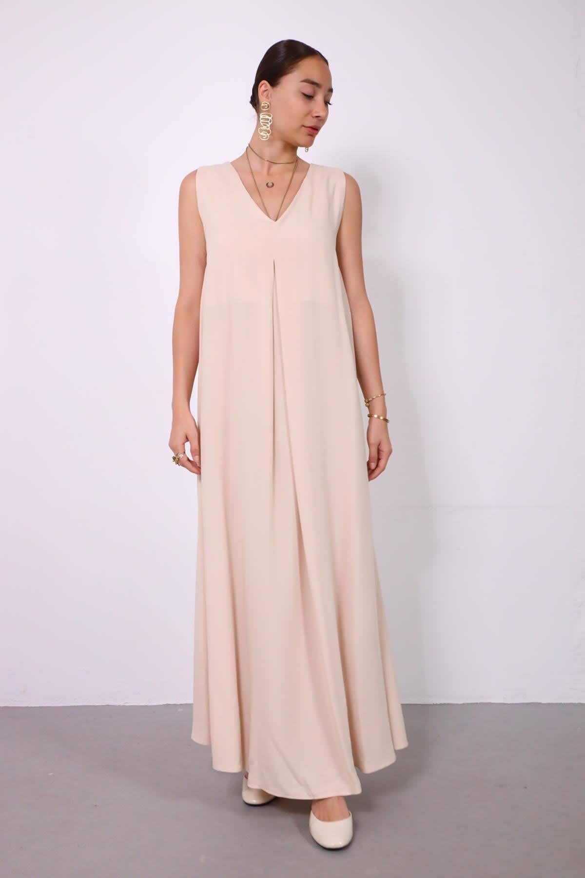 Krem Rengi V Yaka Yırtmaçlı Önden Pileli Elbise - Şaman Butik Krem Rengi V Yaka Yırtmaçlı Önden Pileli Elbise