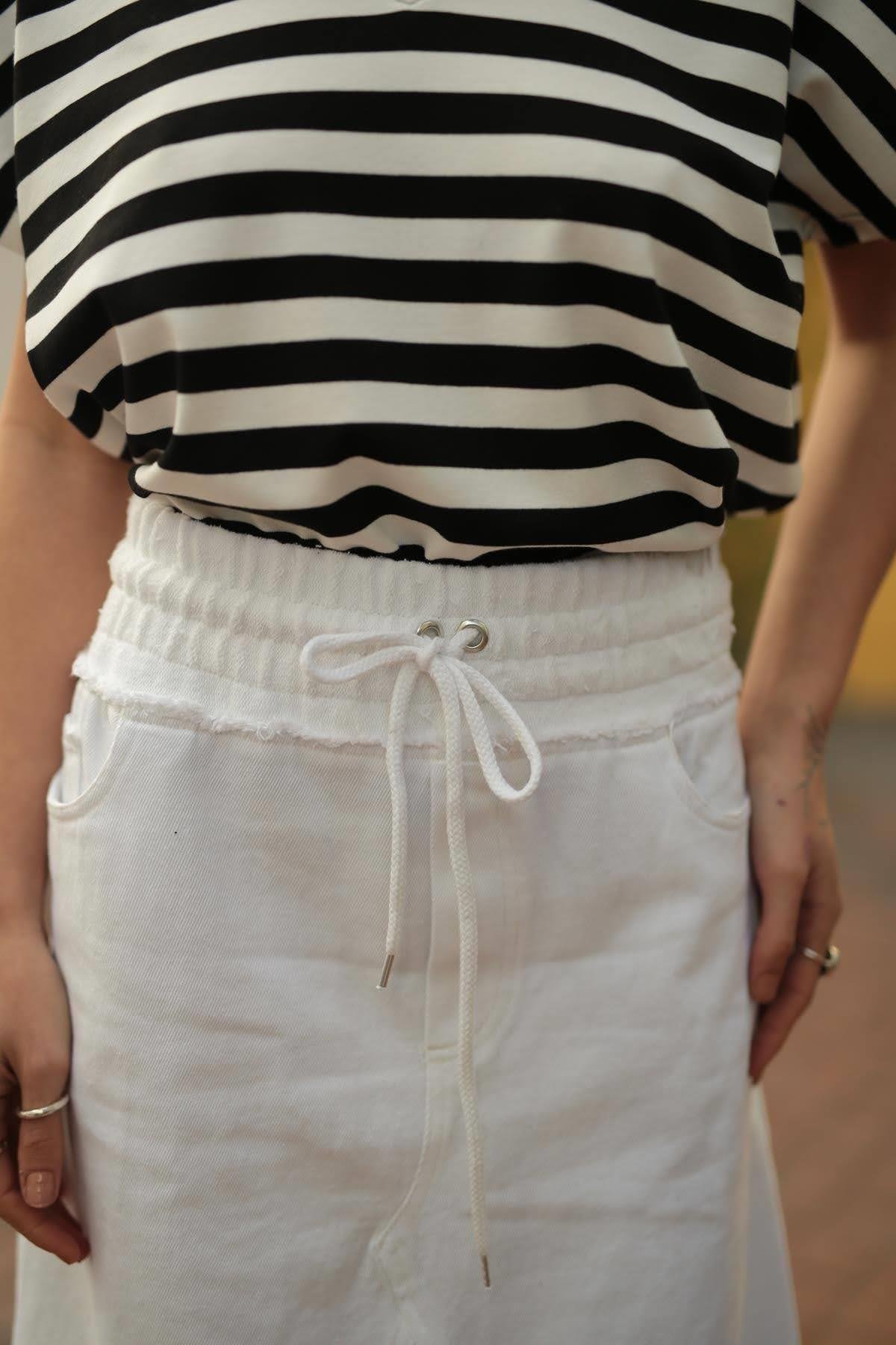 Ekru Beli Lastikli Püsküllü Kot Etek