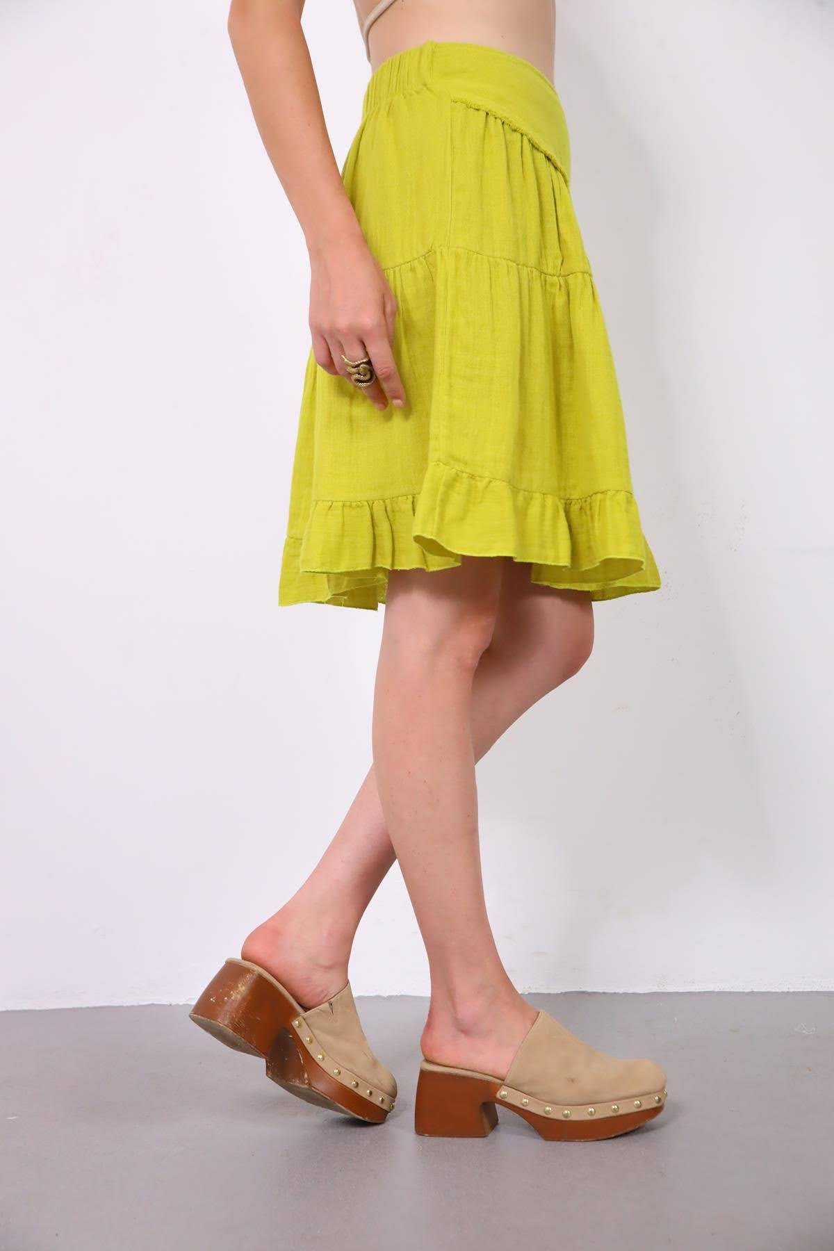  Fıstık Yeşili Asimetrik Püsküllü Müslin Etek