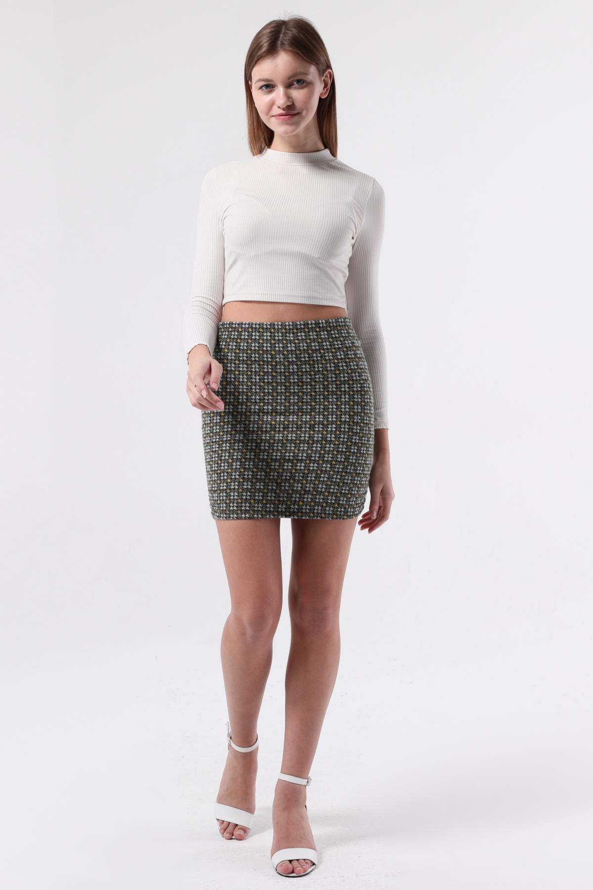 SEZER AKTAŞ HAKİ KAZAYAĞI YANI BÜZGÜLÜ MİNİ ETEK