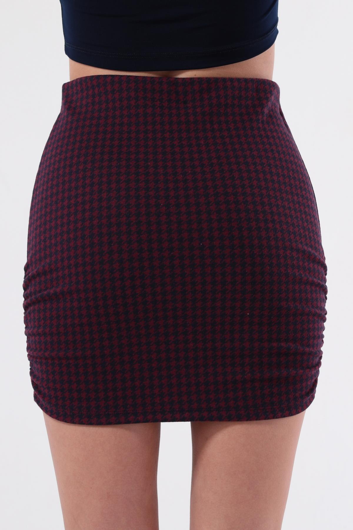 SEZER AKTAŞ YANI BÜZGÜLÜ LACİVERT KAZAYAĞI MİNİ ETEK