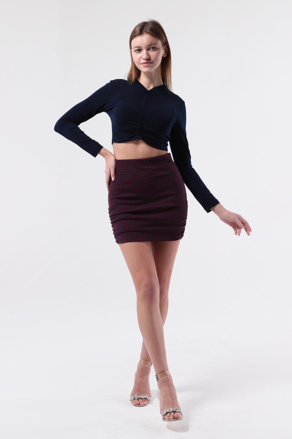 SEZER AKTAŞ YANI BÜZGÜLÜ LACİVERT KAZAYAĞI MİNİ ETEK