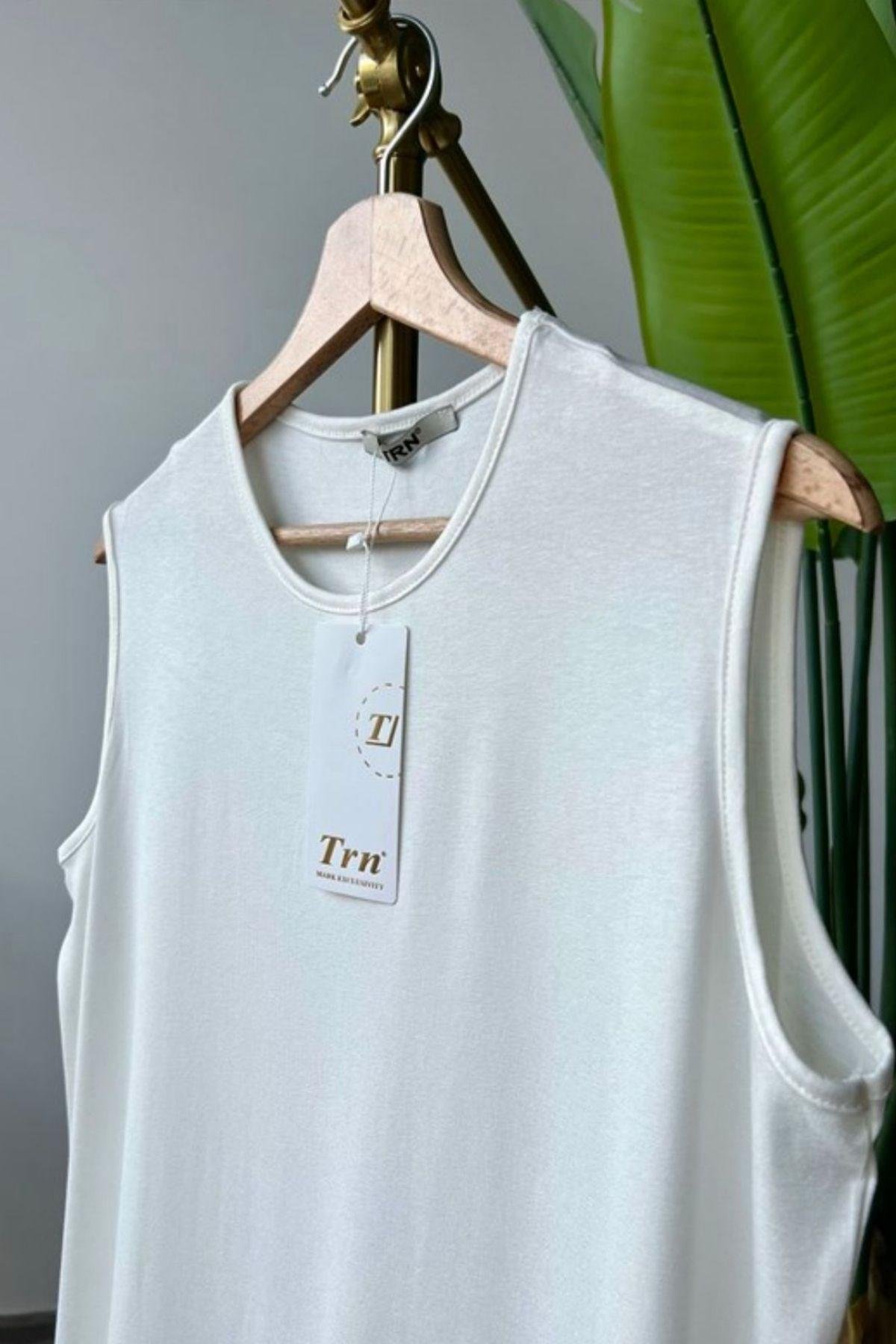 Piliseli İçlik-BEYAZ, Fiyatları Sıfır Kol İçlik Düz BEYAZ – Haza Moda | Tesettür Giyim