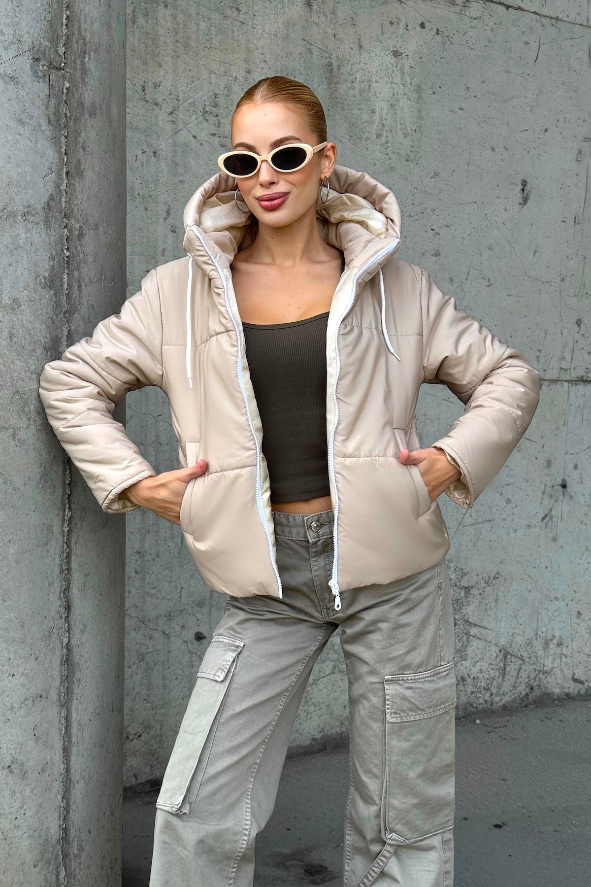 معطف بيج مقاوم للماء بقلنسوة قابل للنفخ بغطاء رأس بيج