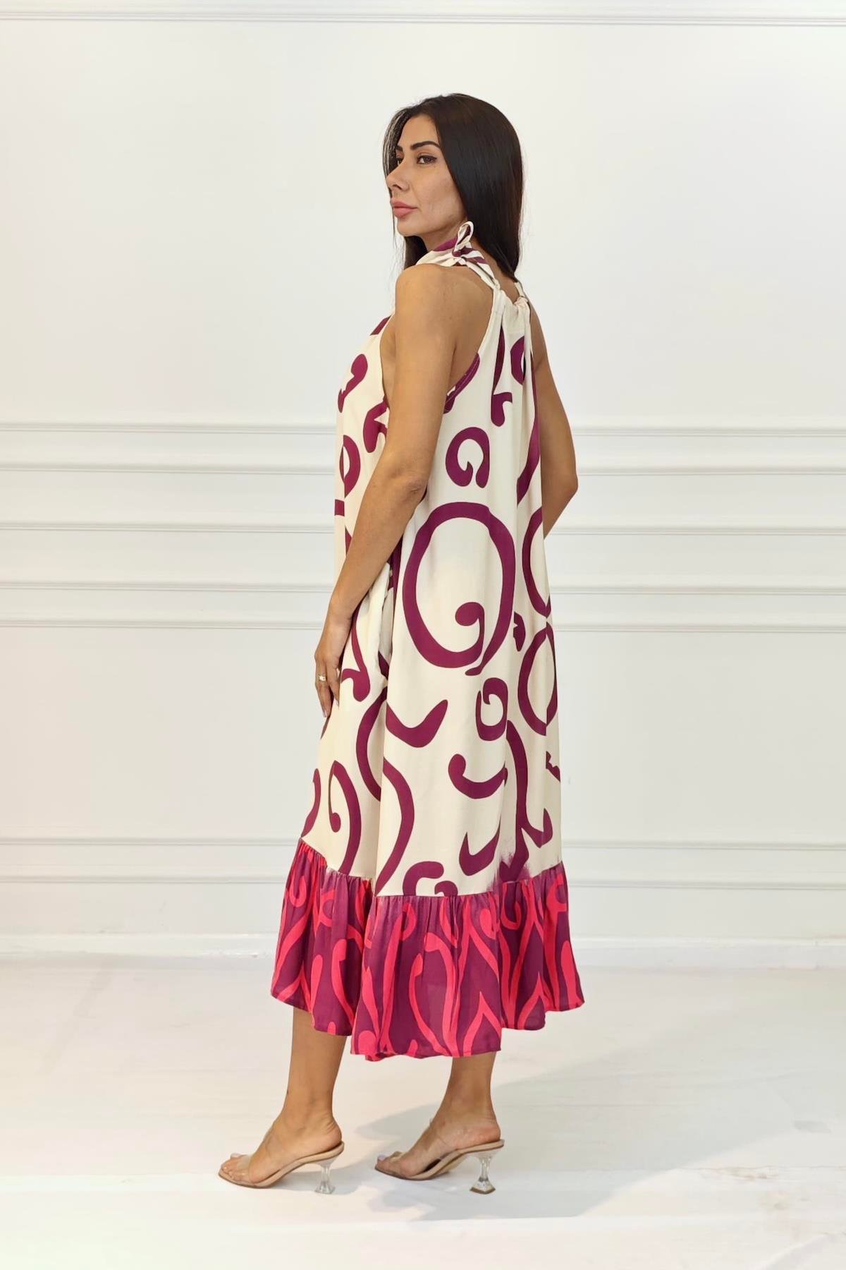 Fuşya Desenli Boyundan Bağlamalı Cepli Uzun Elbise