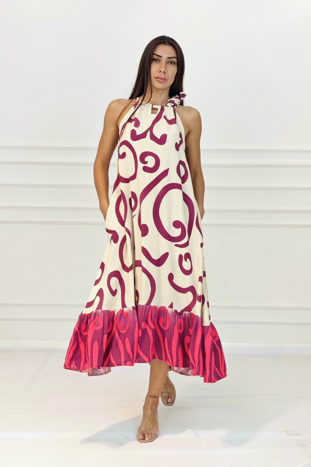 Fuşya Desenli Boyundan Bağlamalı Cepli Uzun Elbise