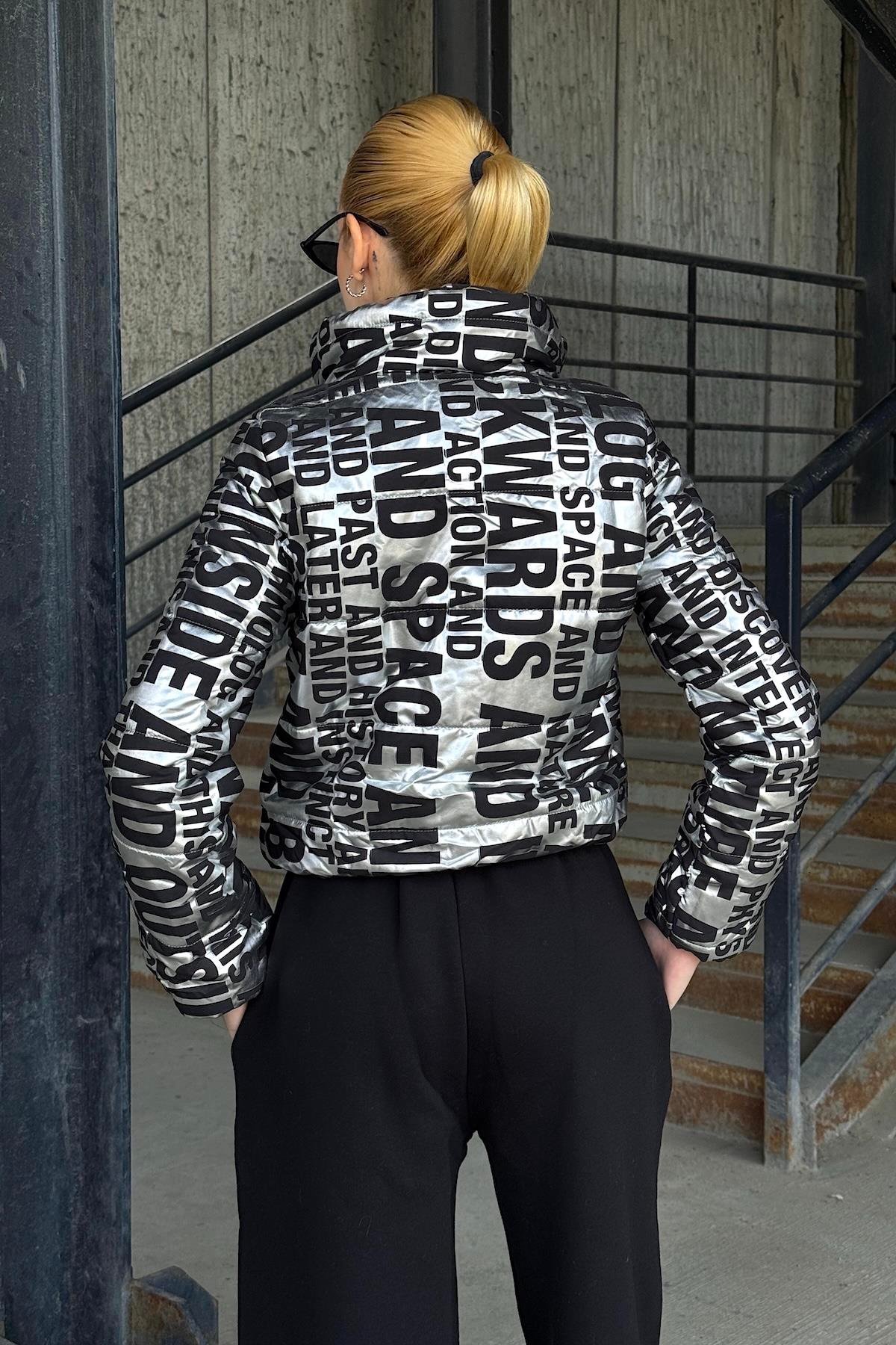 معطف بياقة قصيرة قابل للنفخ بياقة قصيرة فضية سوداء لامعة بياقة قابلة للنفخ مع سحاب للإغلاق