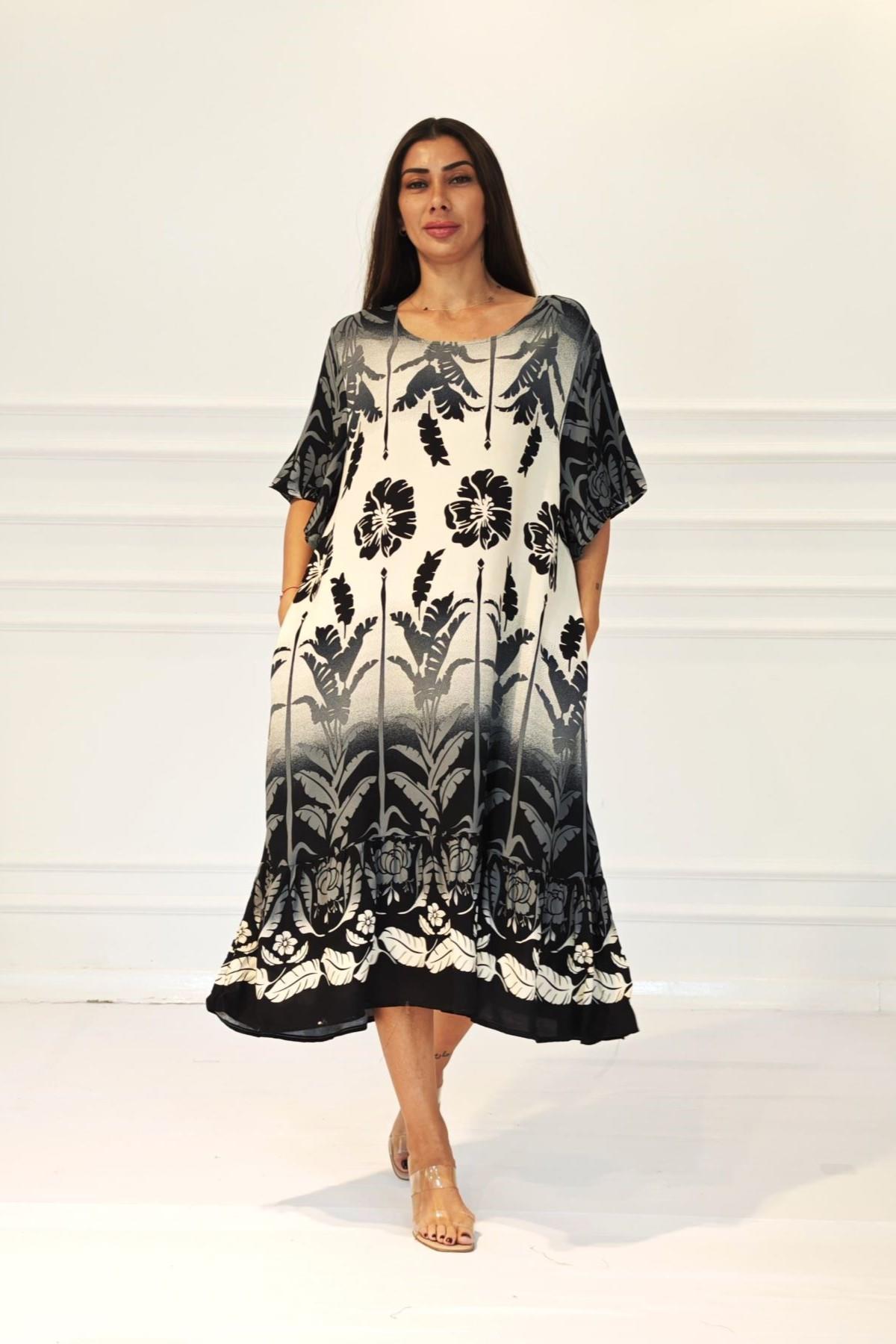 Siyah Çiçekli Kayık Yaka Cepli Etekleri Fırıfırlı Midi Elbise