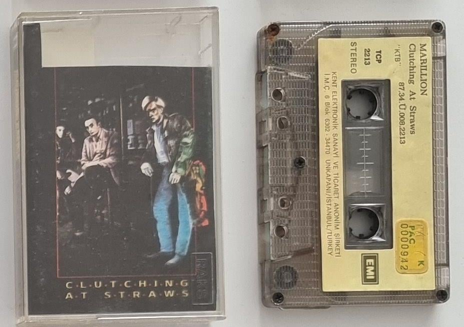 MARILLION - CLUTCHING AT STRAWS