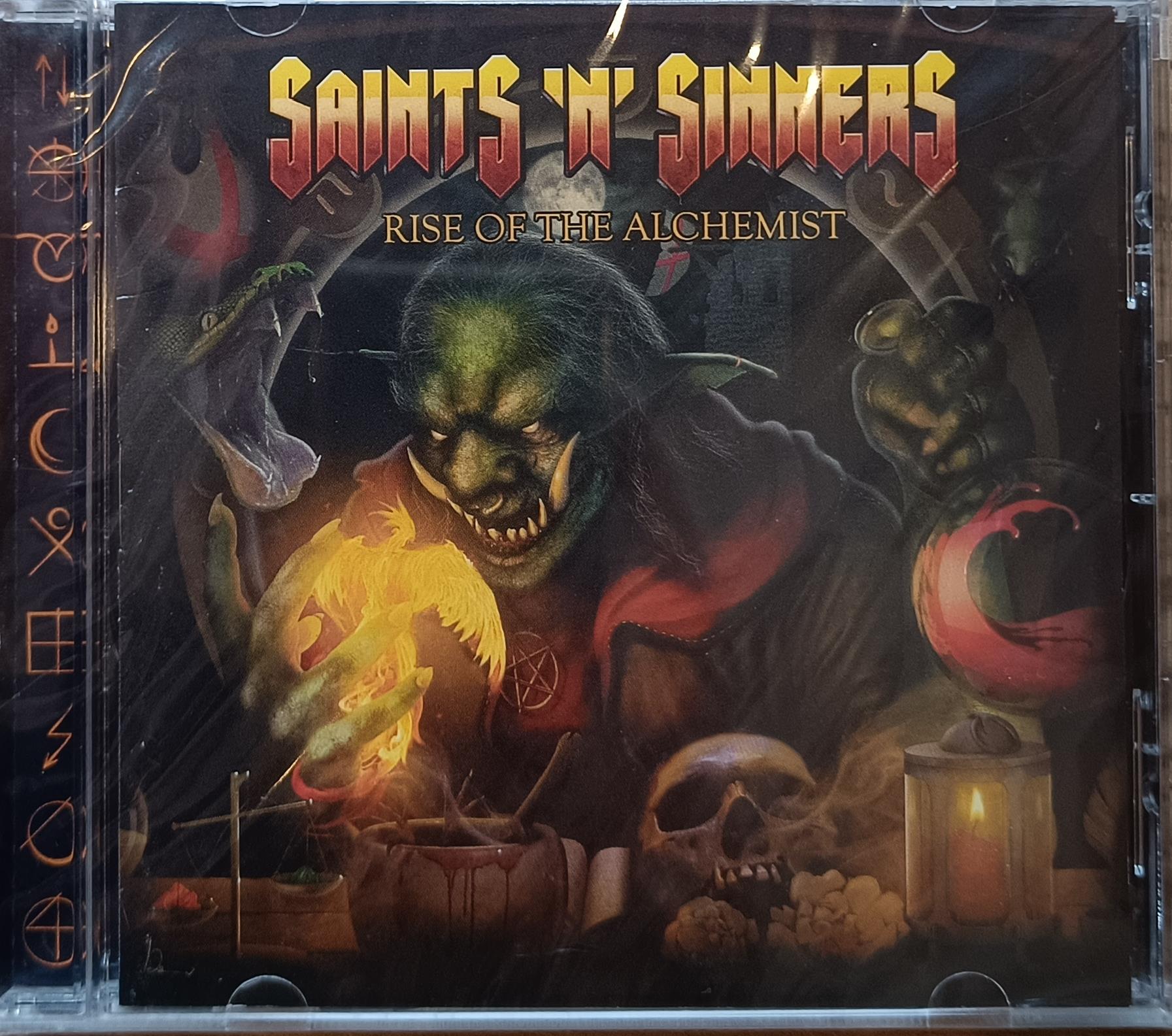 SAINT 'N' SINNERS - RISE OF THE ALCHEMIST (BOX SET & DOUBLE KIRMIZI RENKLİ PLAK & ALBÜM KAPAĞININ GÖRSELİNİN YER ALDIĞI MEDIUM BEDEN T-SHIRT & ALBÜM AUDIO CD & STICKER SETİ)  (SINIRLI SAYIDA ÜRETİLMİŞTİR !)