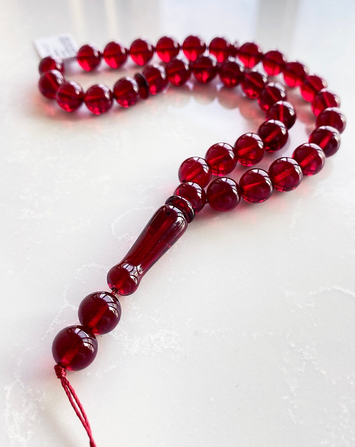 8 mm Küre Kesim Dominik Kırmızı Damla Kehribar Tesbih