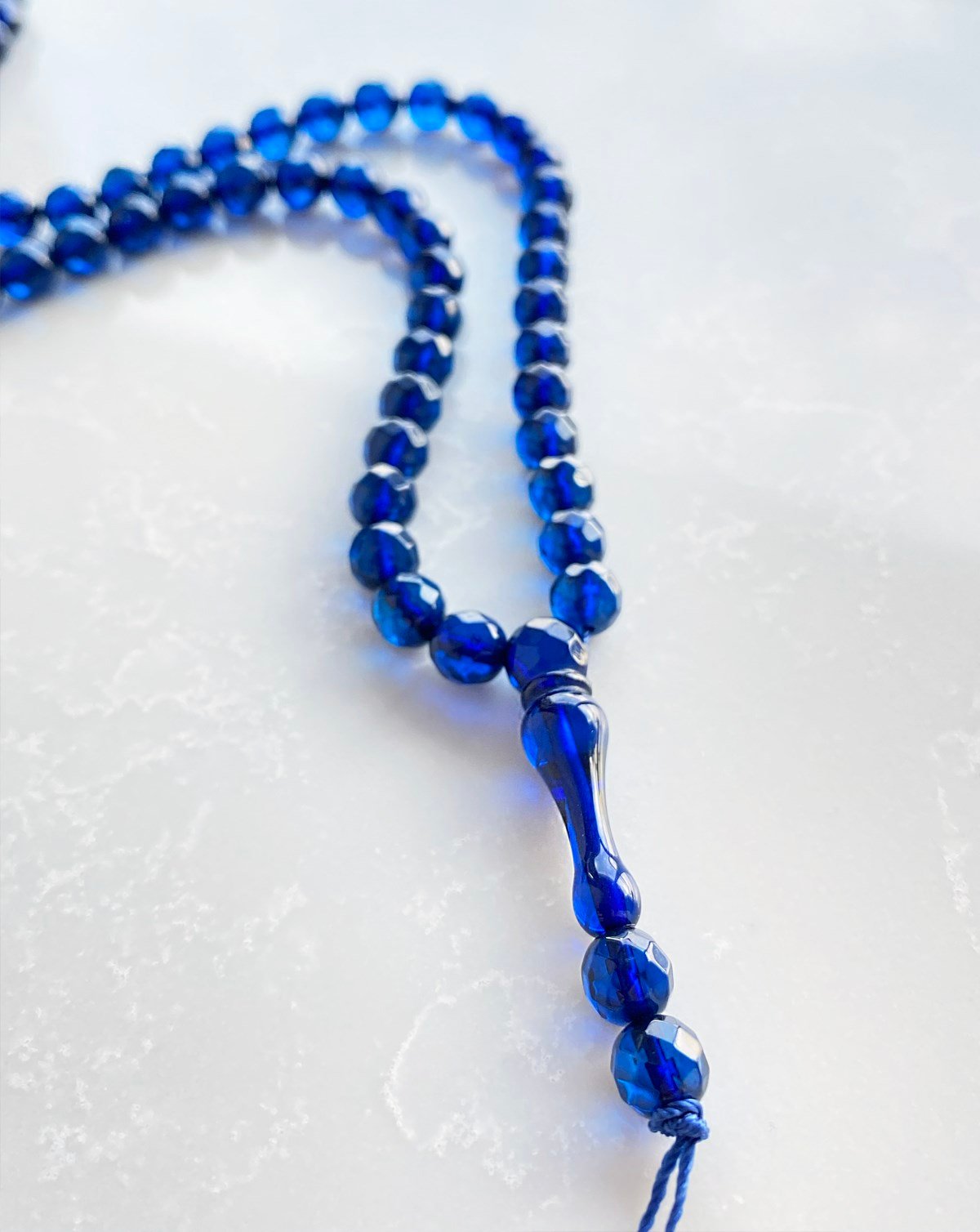 99'lu Fasetli 6 mm Dominik Mavi Damla Kehribar Tesbih