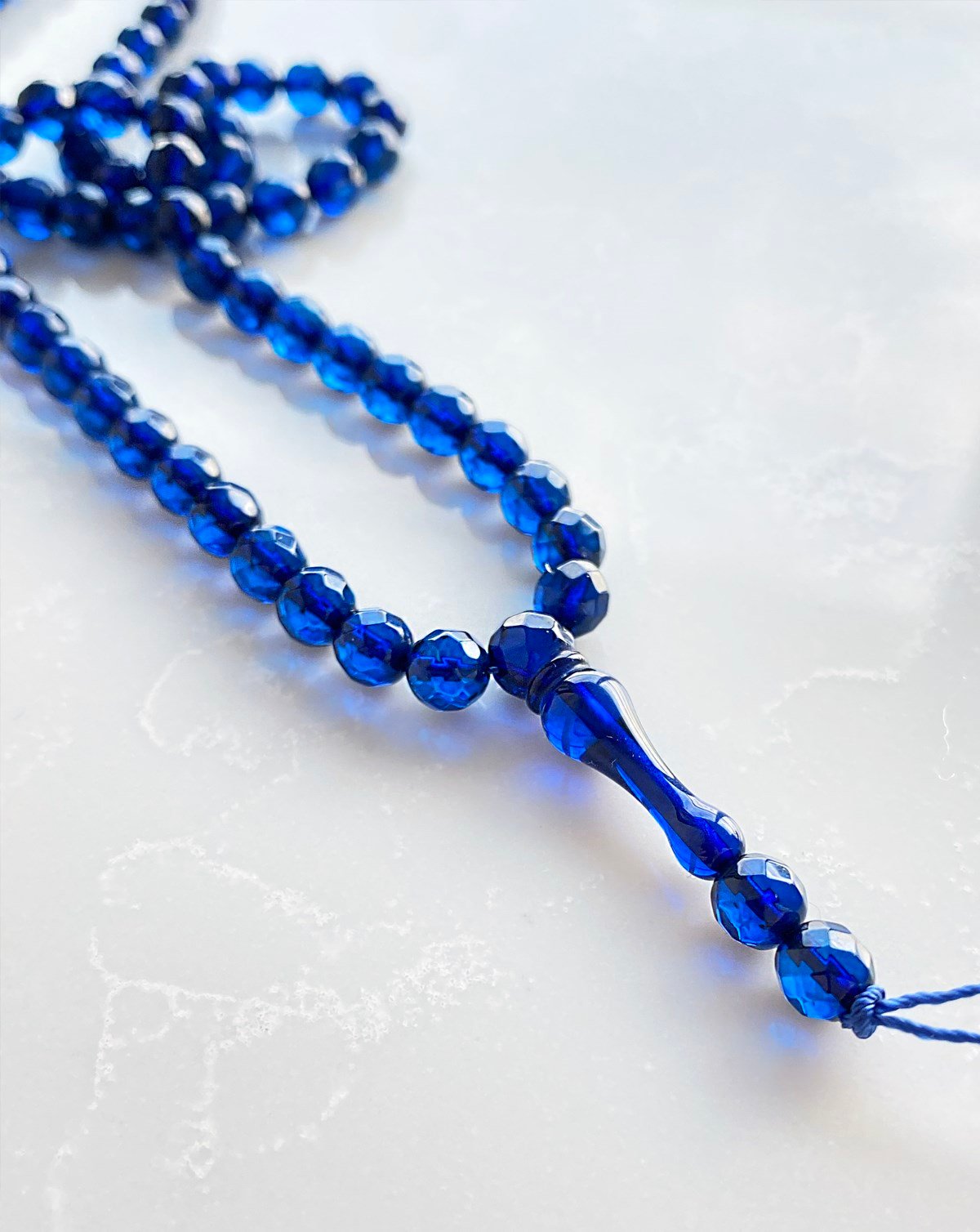 99'lu Fasetli 6 mm Dominik Mavi Damla Kehribar Tesbih