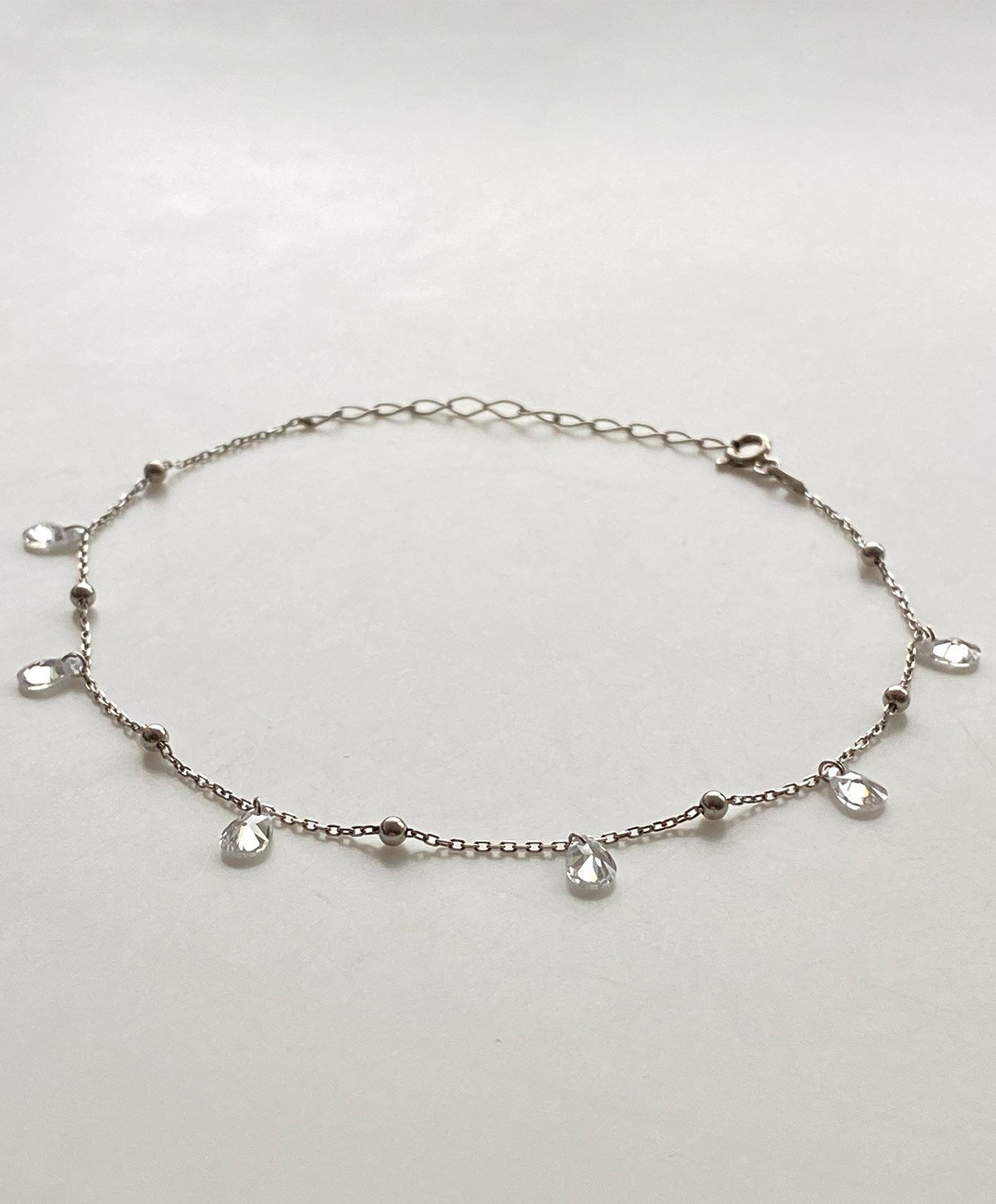 Oval Beyaz Taşlı Top Detaylı Gümüş Halhal