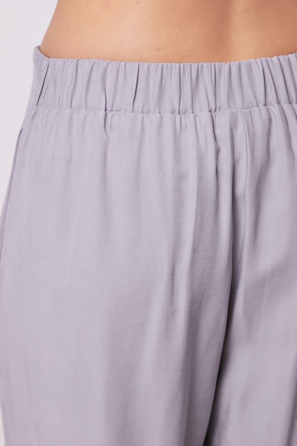 JUMENTkadın modal diyagonal yüksek bel yan cepli arkası lastikli bol paça pantolon