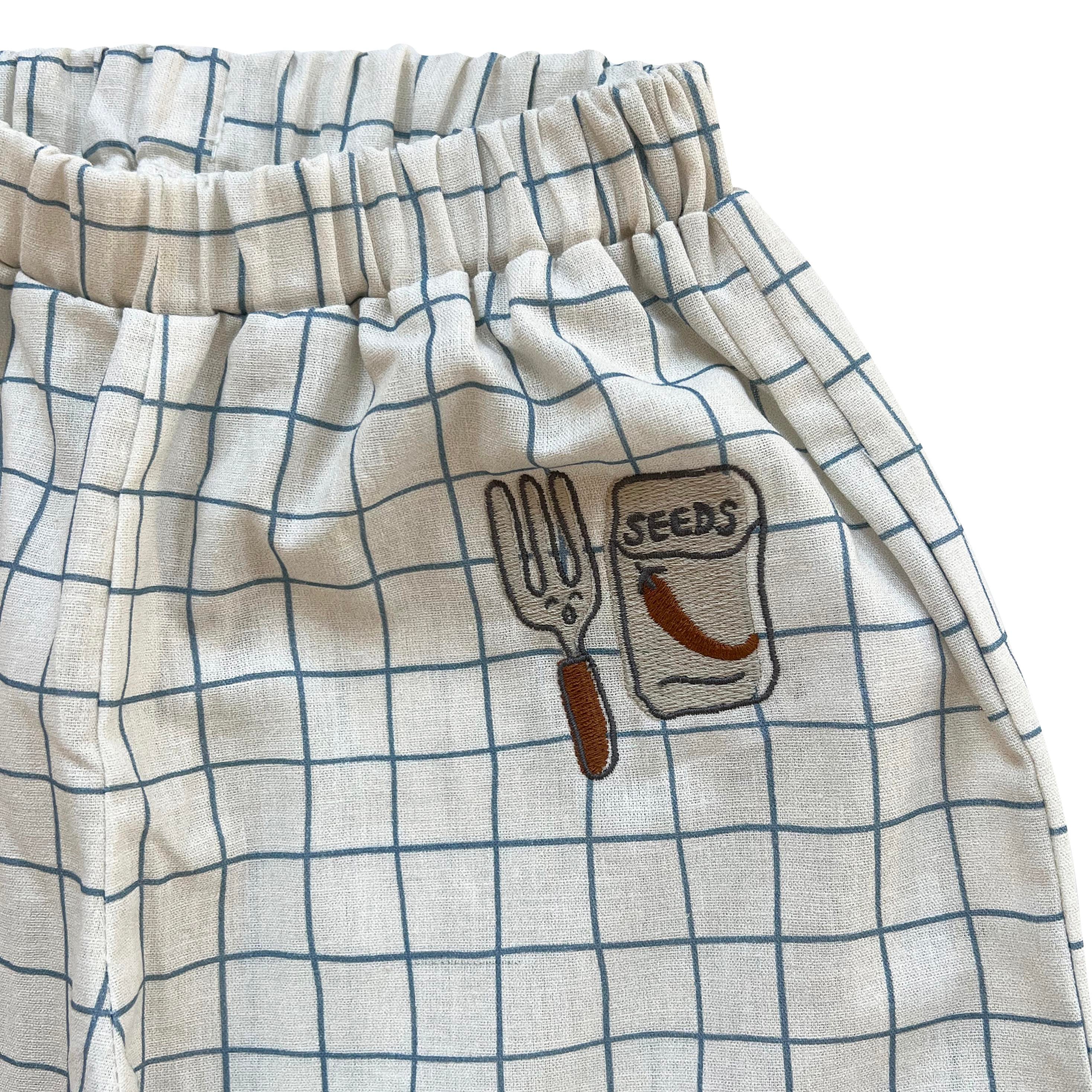 WIDE CHECKED ‘SEEDS' TROUSERS