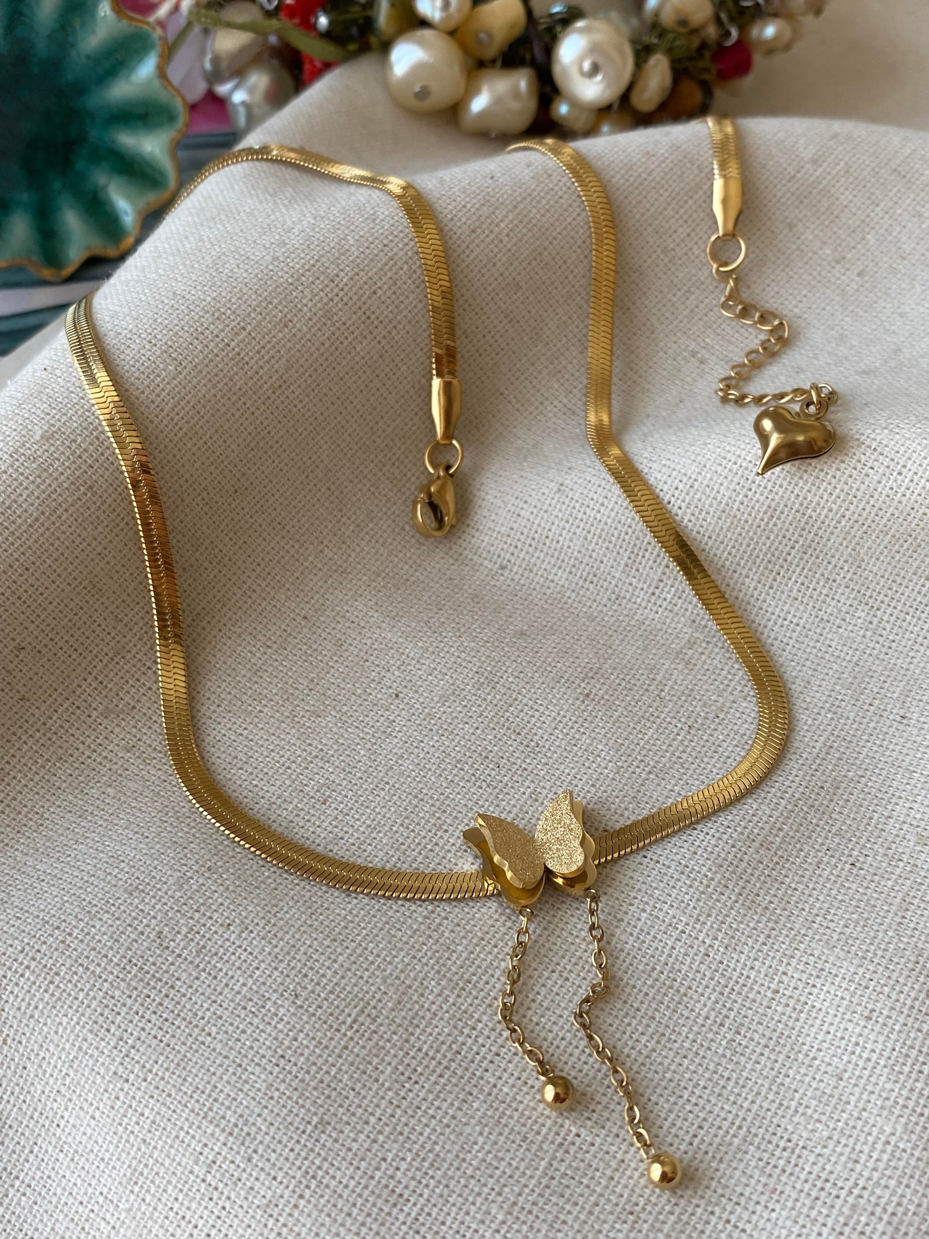  Çelik Yassı Kelebek Kolye