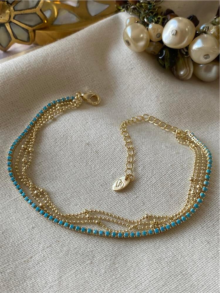 14K Dörtlü Mavi Suyolu Detaylı Dorikalı Bileklik