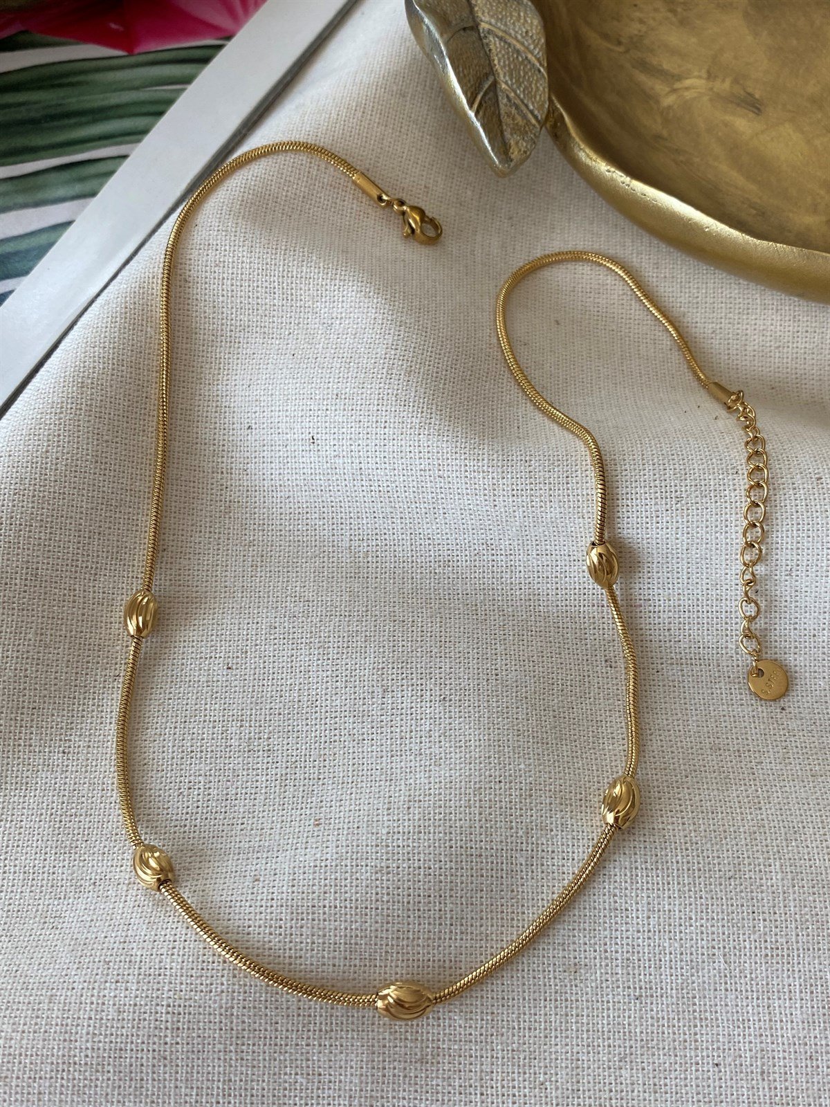 Çelik Desenli Badem Kolye