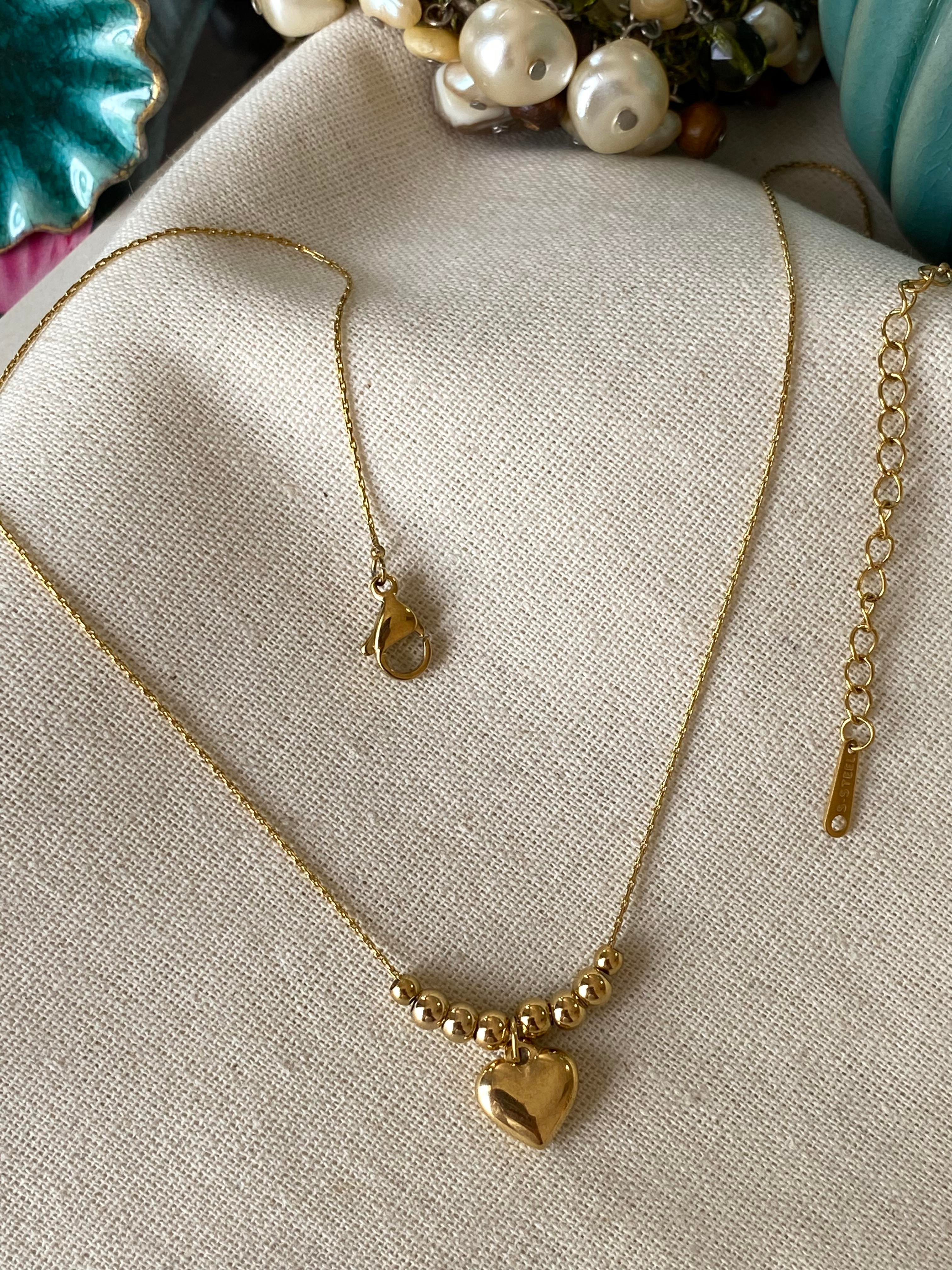 Çelik Dorikalı Kalp Kolye