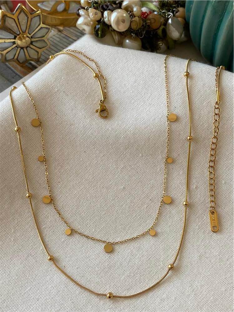 Çelik İkili Dorikalı Pullar Kolye