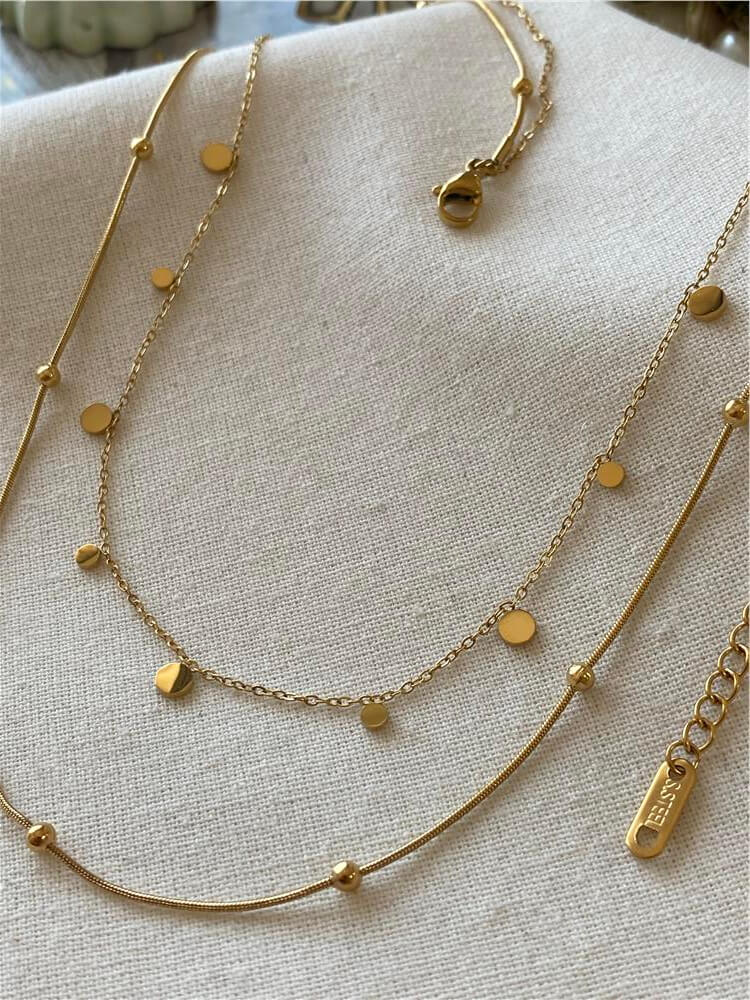 Çelik İkili Dorikalı Pullar Kolye