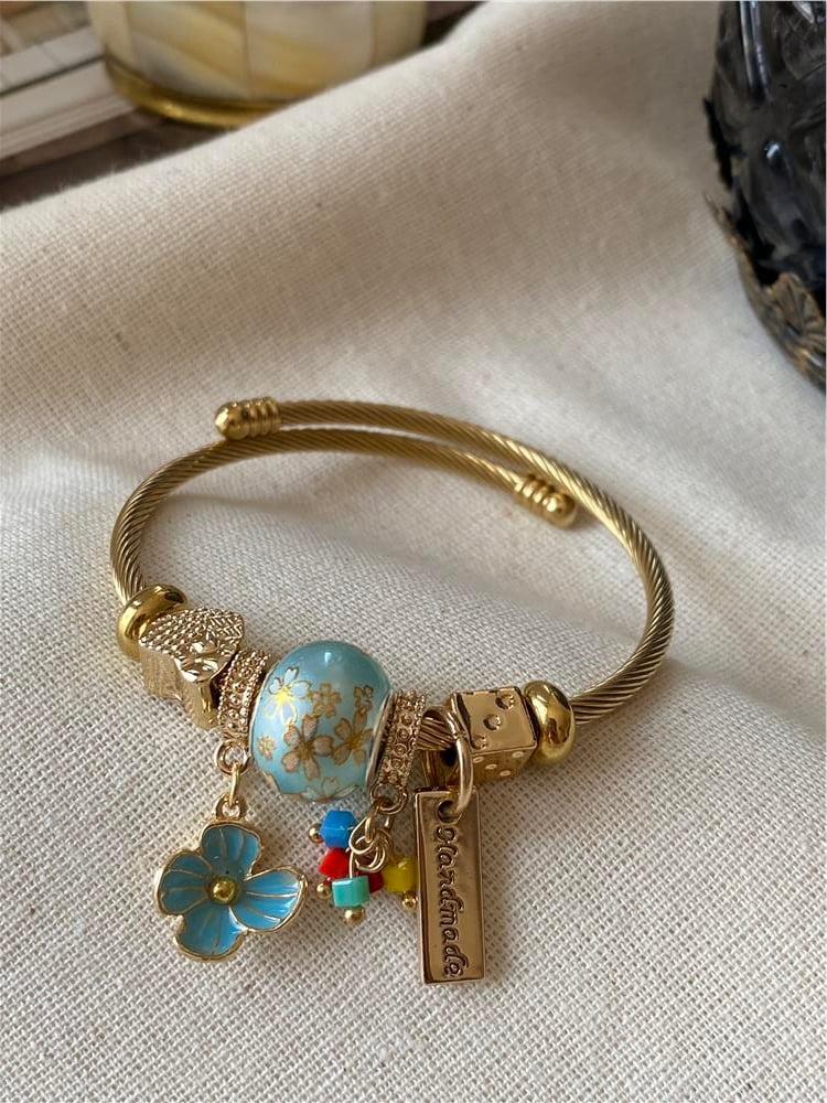 Çelik Mavi Çiçek Charmlı Bileklik