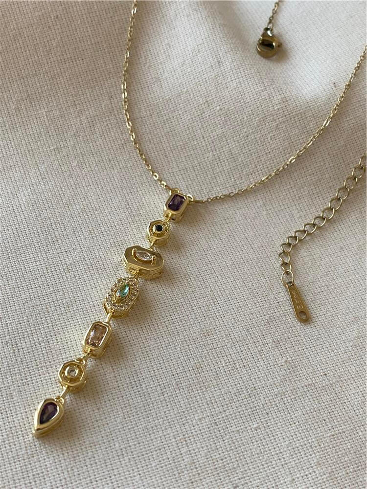 Çelik Mor Taşlı Gold Dekolte Kolye