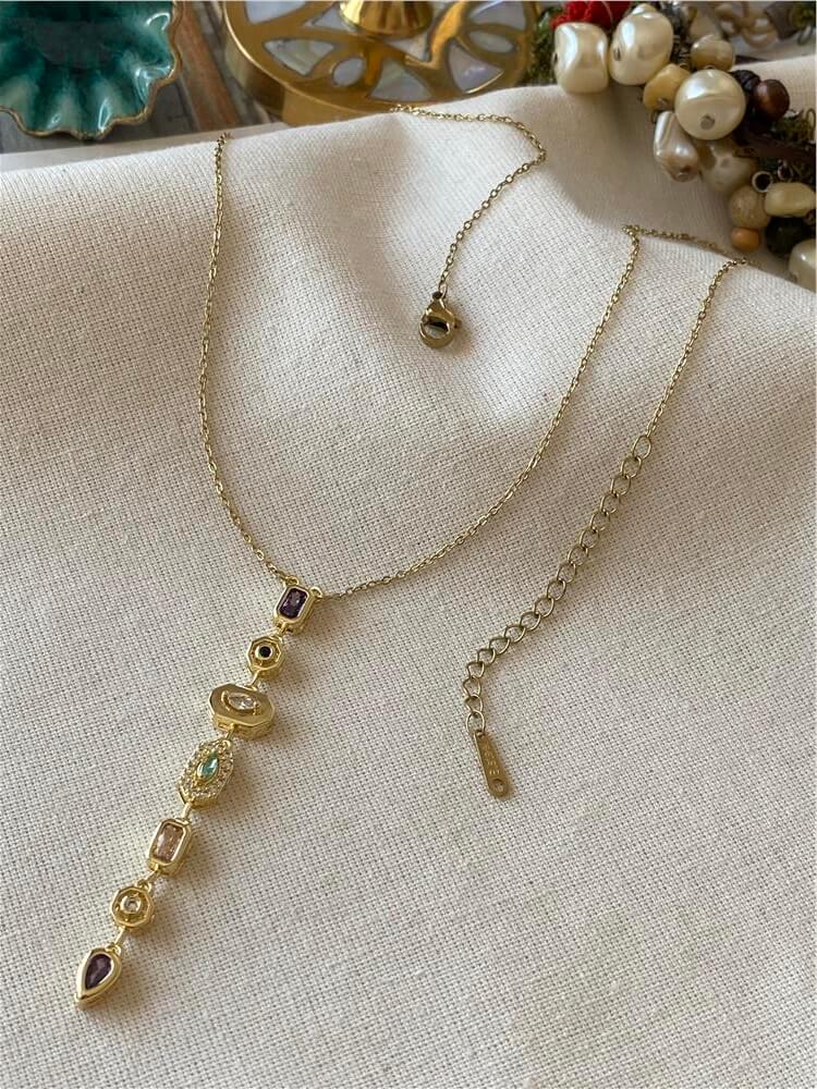 Çelik Mor Taşlı Gold Dekolte Kolye