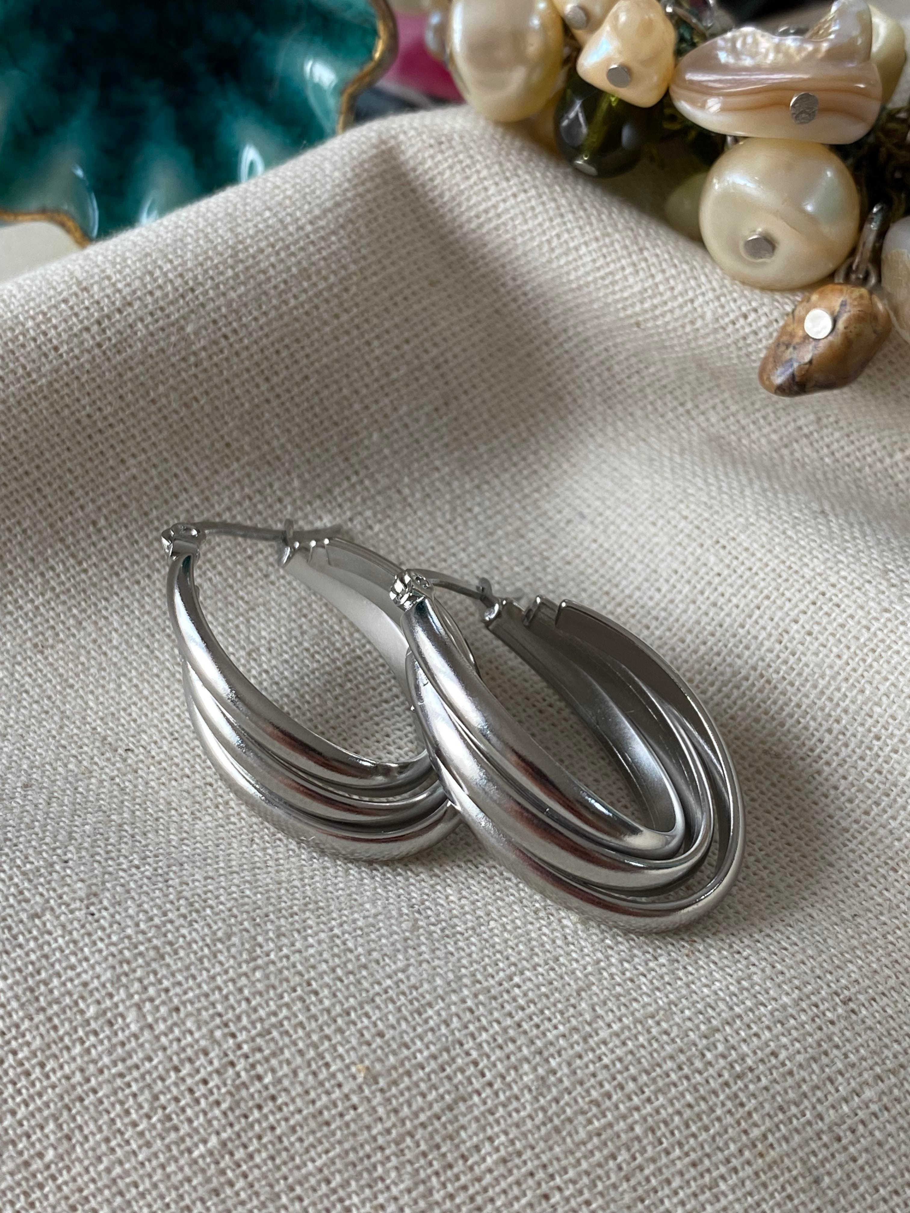 Çelik Oval Silver Trinity Küpe
