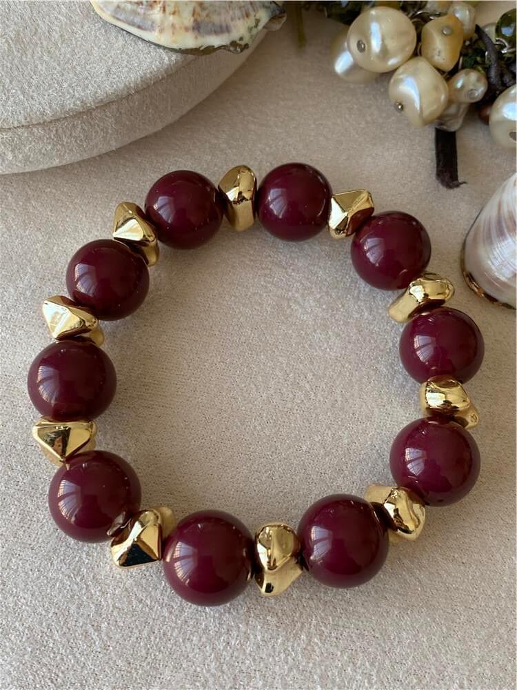Gold Detaylı Bordo Topçuk Esnek Bileklik