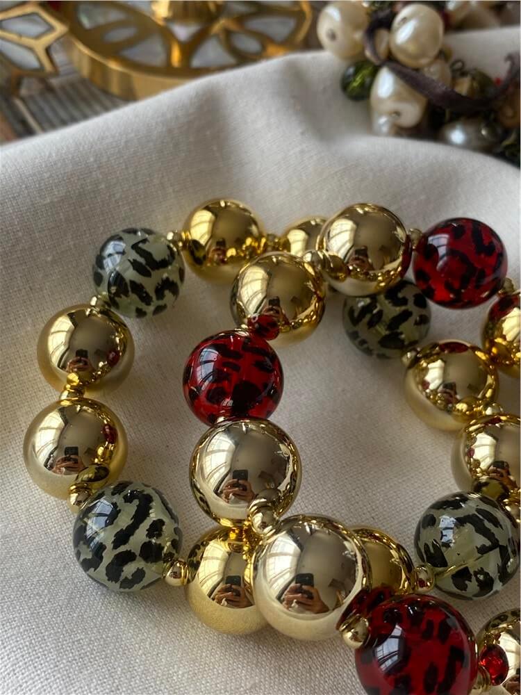 Renkli Topçuk Detaylı Gold Esnek Bileklik