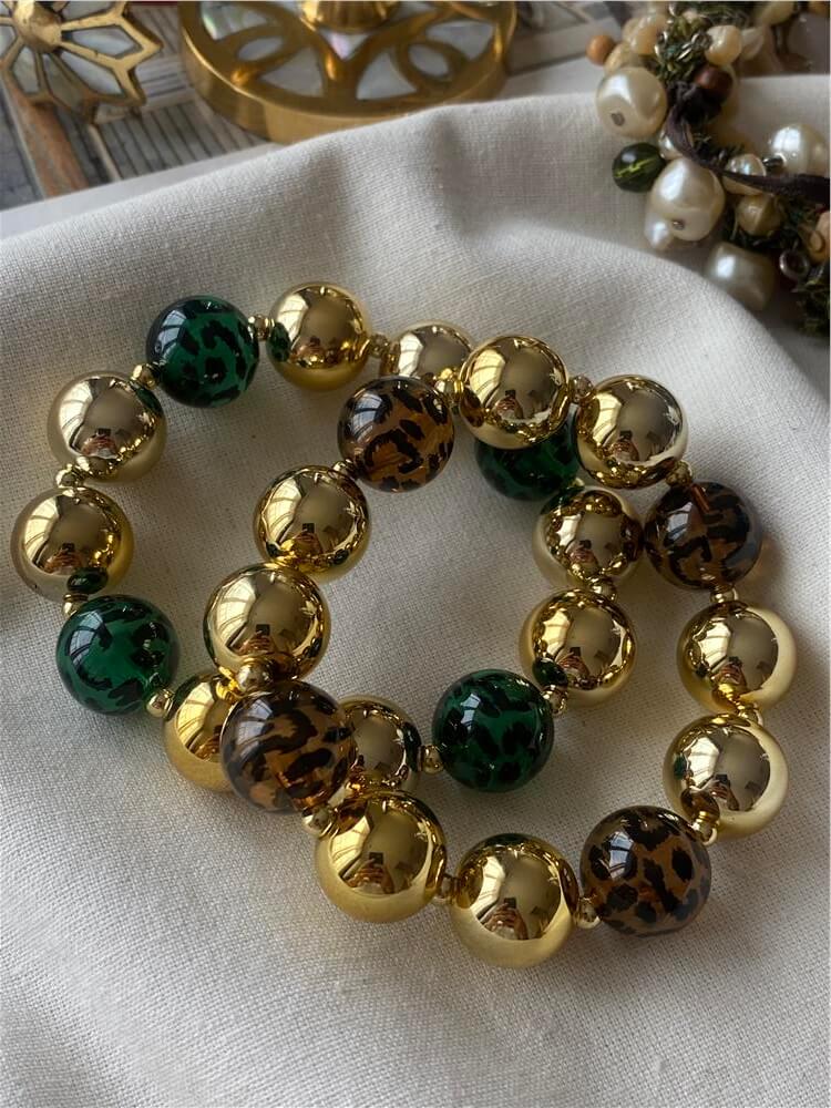 Renkli Topçuk Detaylı Gold Esnek Bileklik