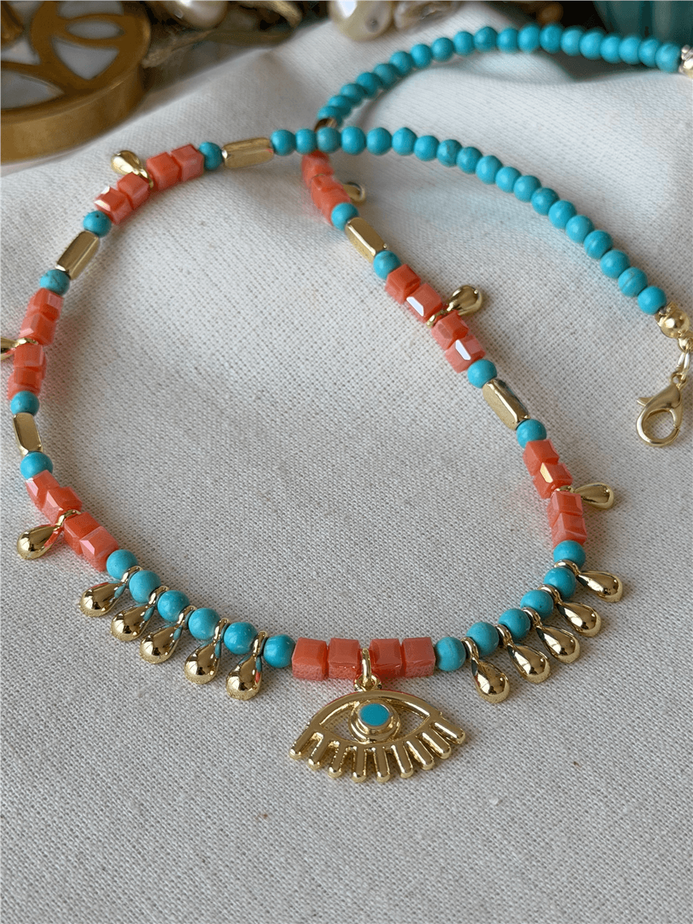 Turuncu Boncuklu Damla Detaylı Göz Kolye