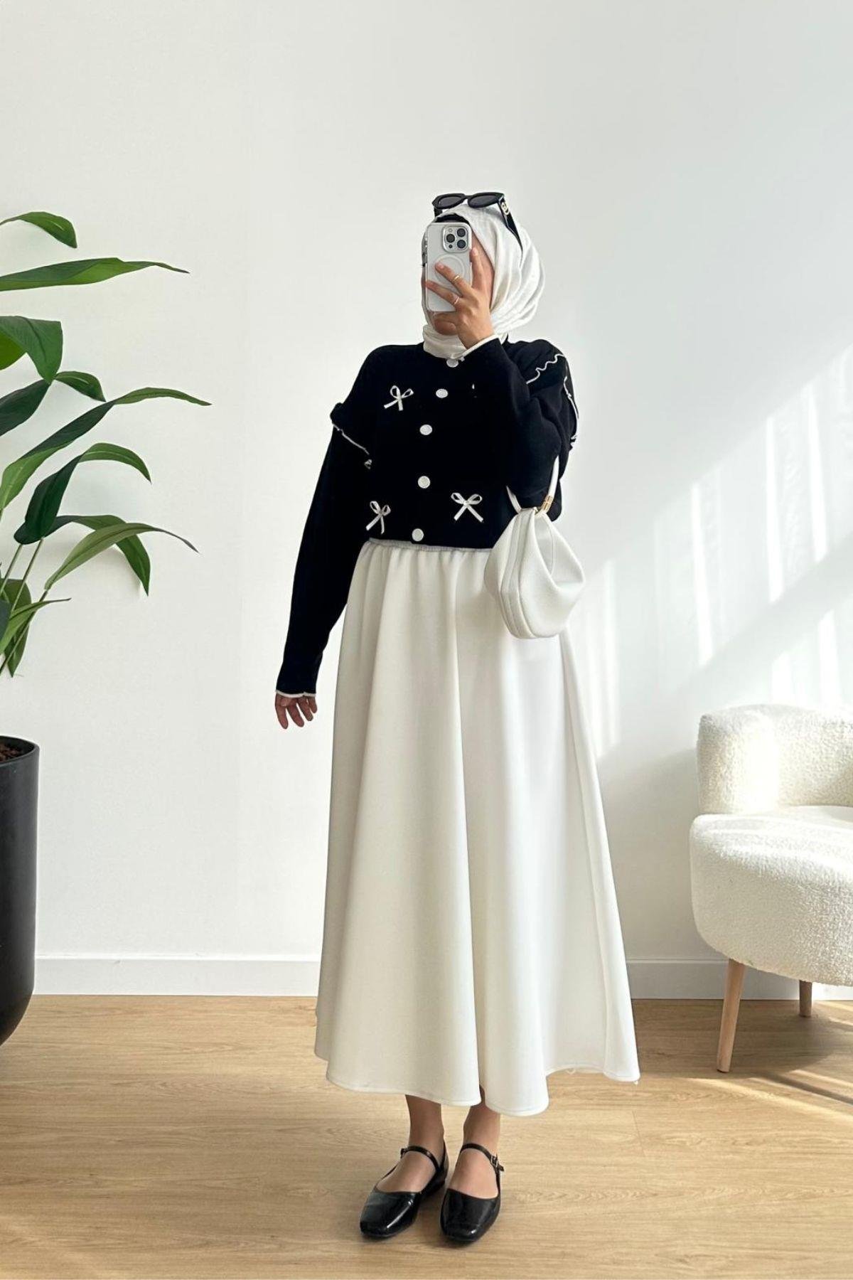 SİYAH FİYONK DETAYLI TRİKO HIRKA