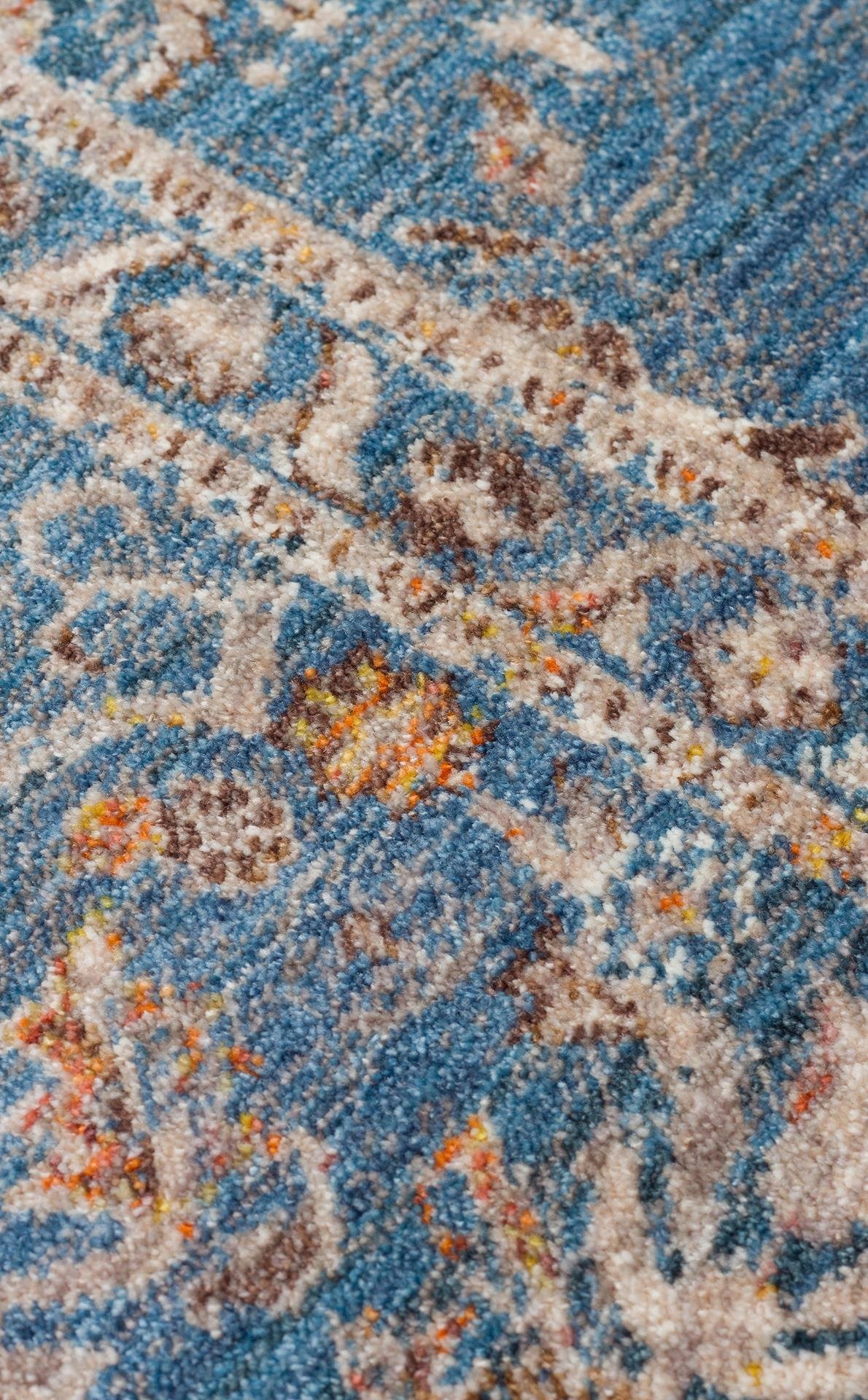 PIETRA PTA 18 NAVY  Sıcak Renk Tonlarını Etnik Desenler ile Buluşturan Yumuşak Tuşeli Makine Halısı