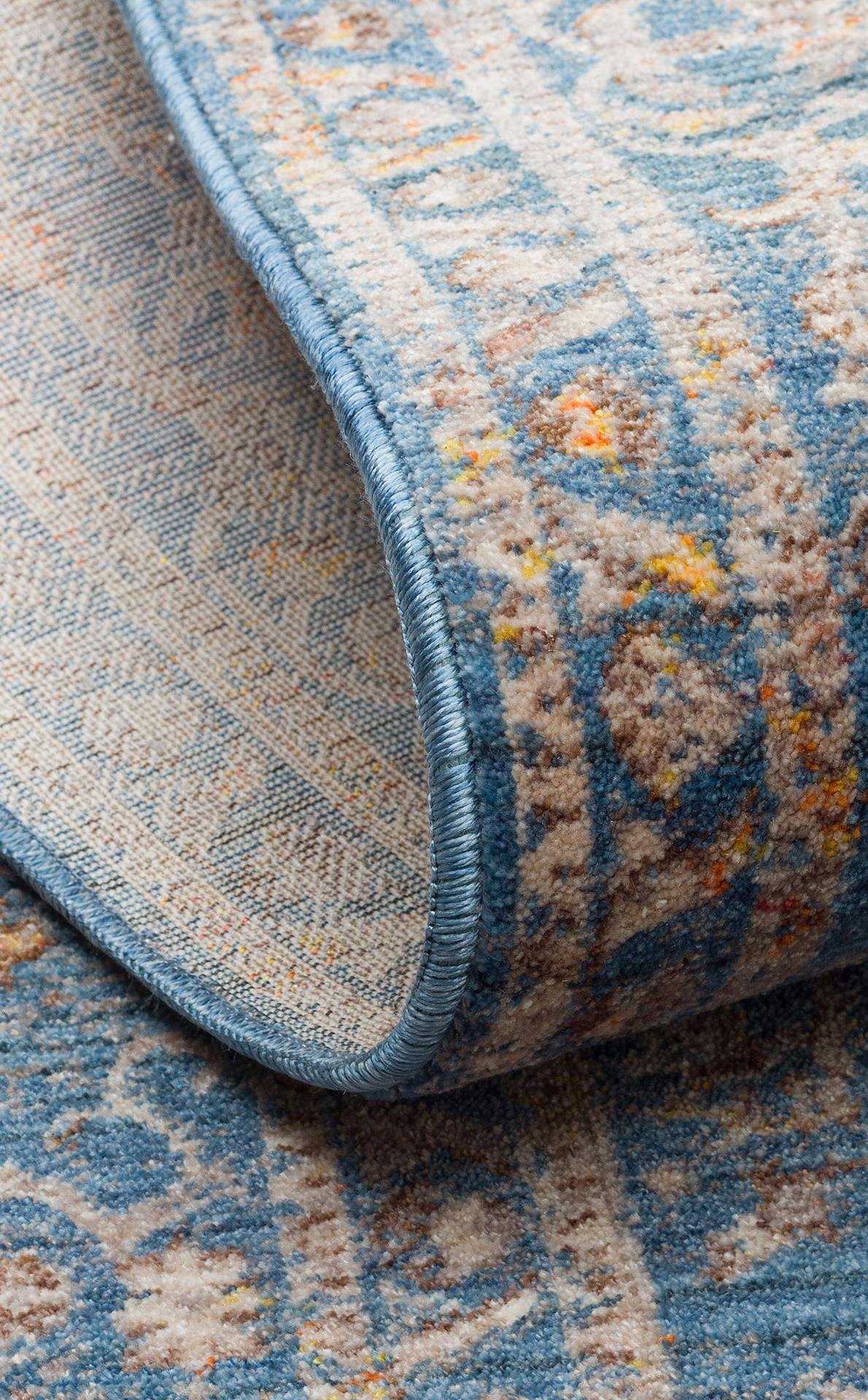 PIETRA PTA 18 NAVY  Sıcak Renk Tonlarını Etnik Desenler ile Buluşturan Yumuşak Tuşeli Makine Halısı