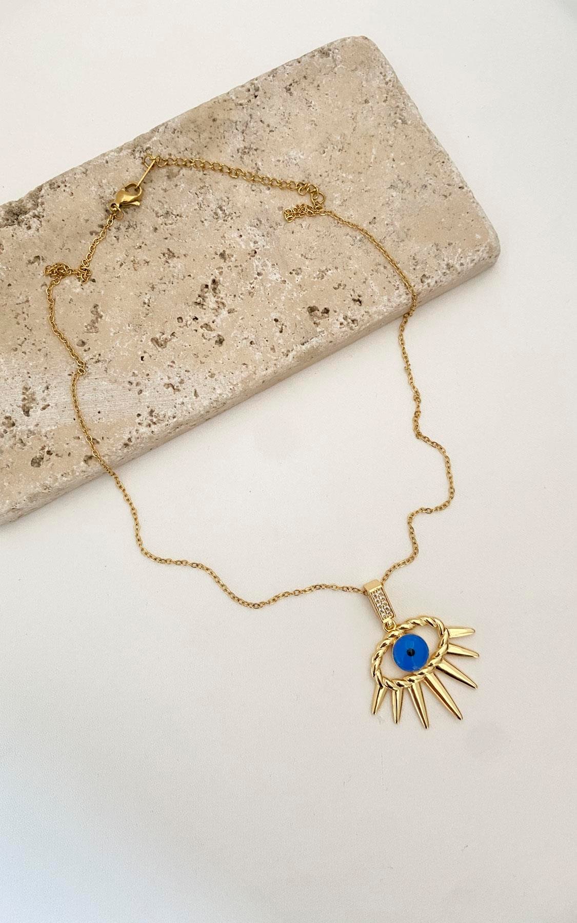 Göz Figürlü Gold Çelik Kolye