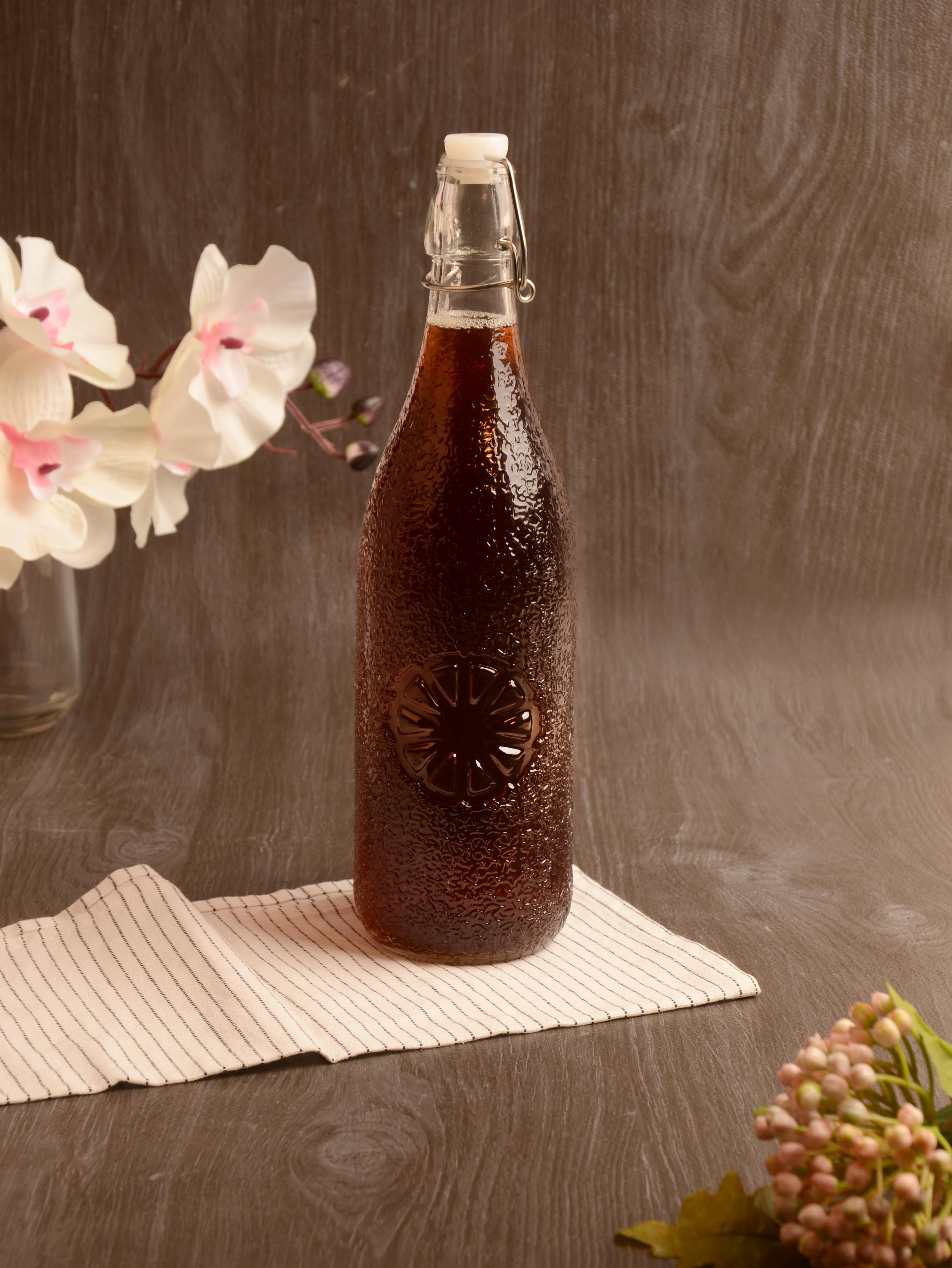 PAÇİ-KELEPÇELİ CAM ŞİŞE