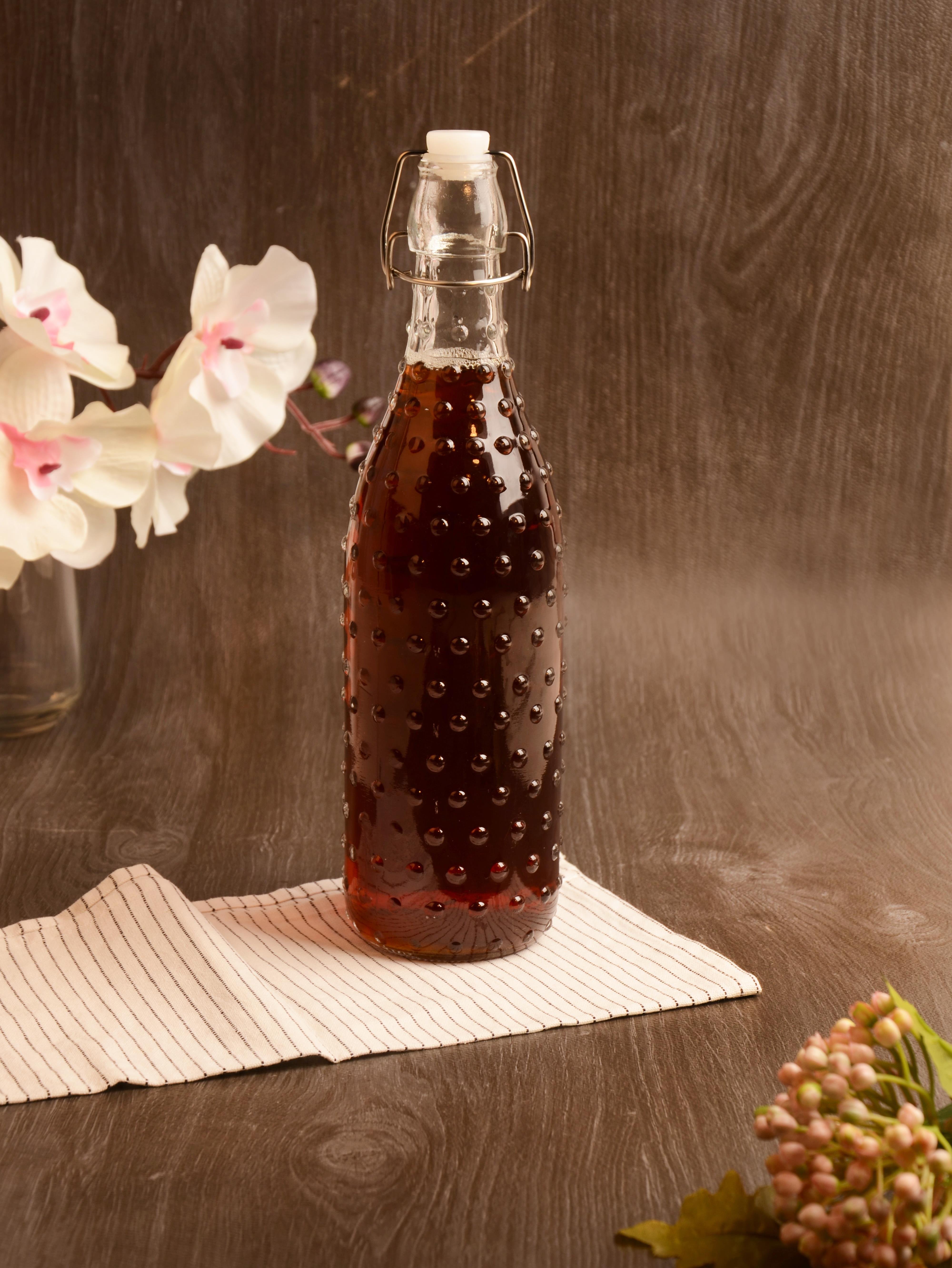 PAÇİ-KELEPÇELİ CAM ŞİŞE