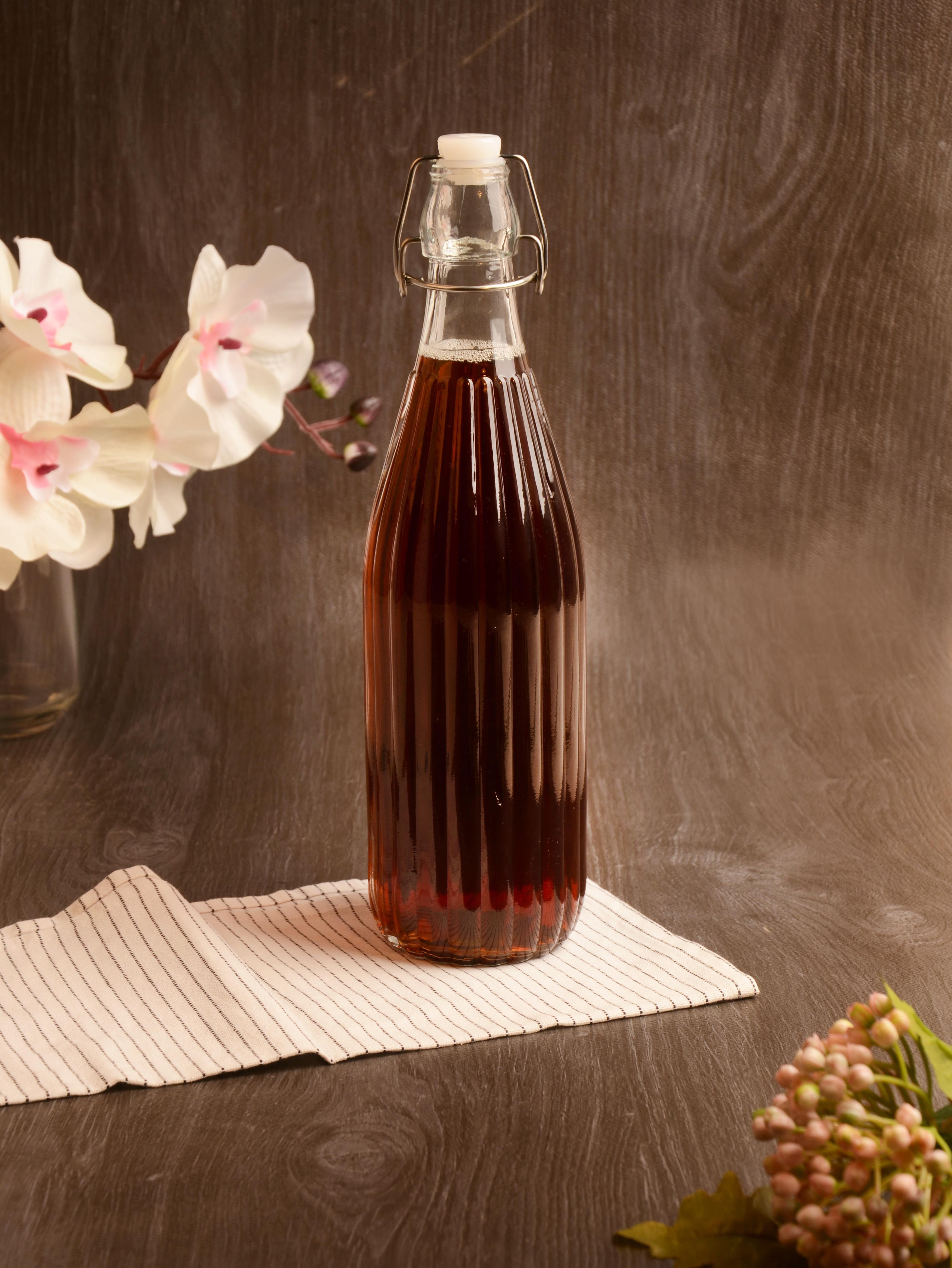 PAÇİ-KELEPÇELİ CAM ŞİŞE