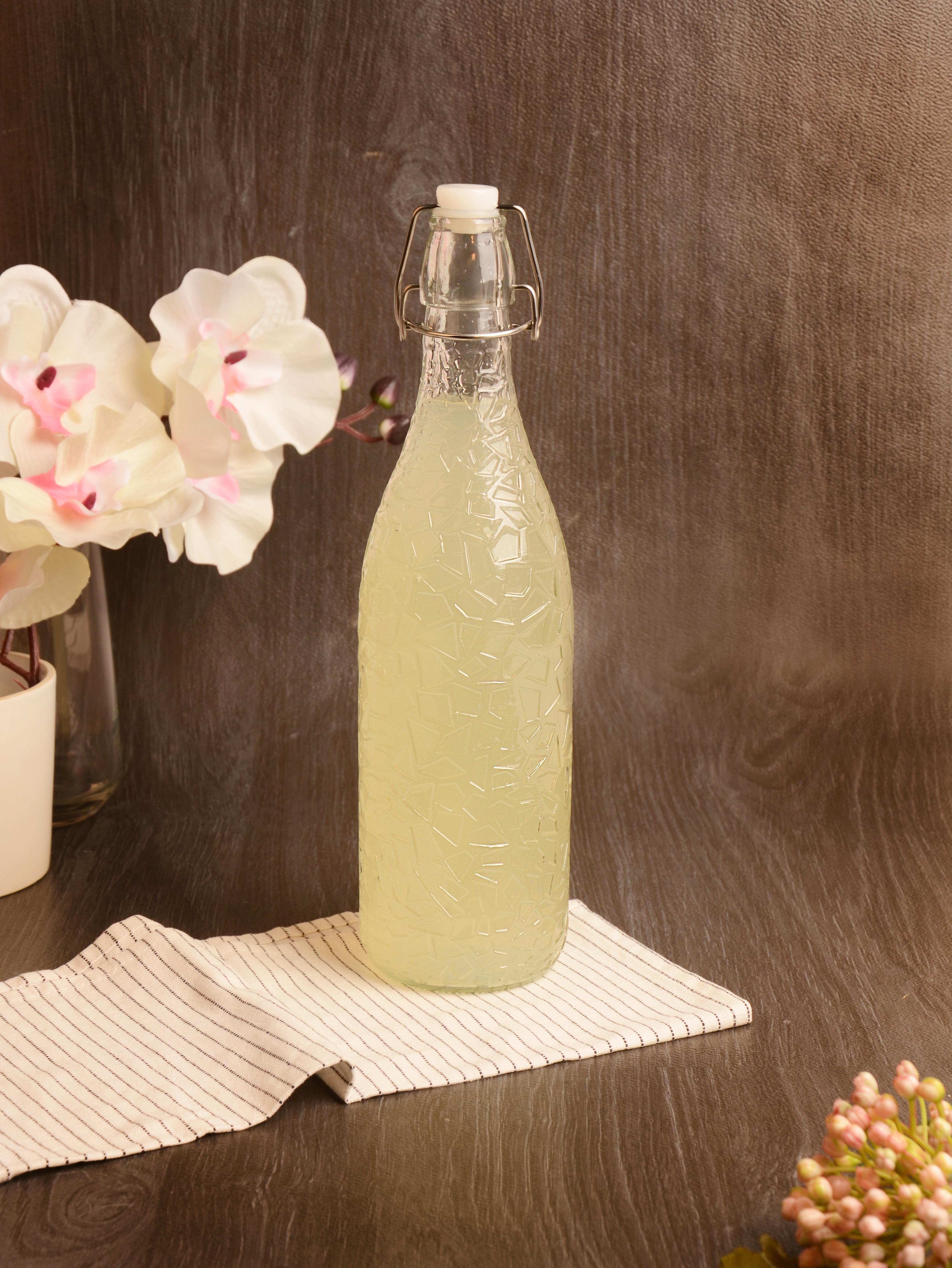 PAÇİ-KELEPÇELİ CAM ŞİŞE