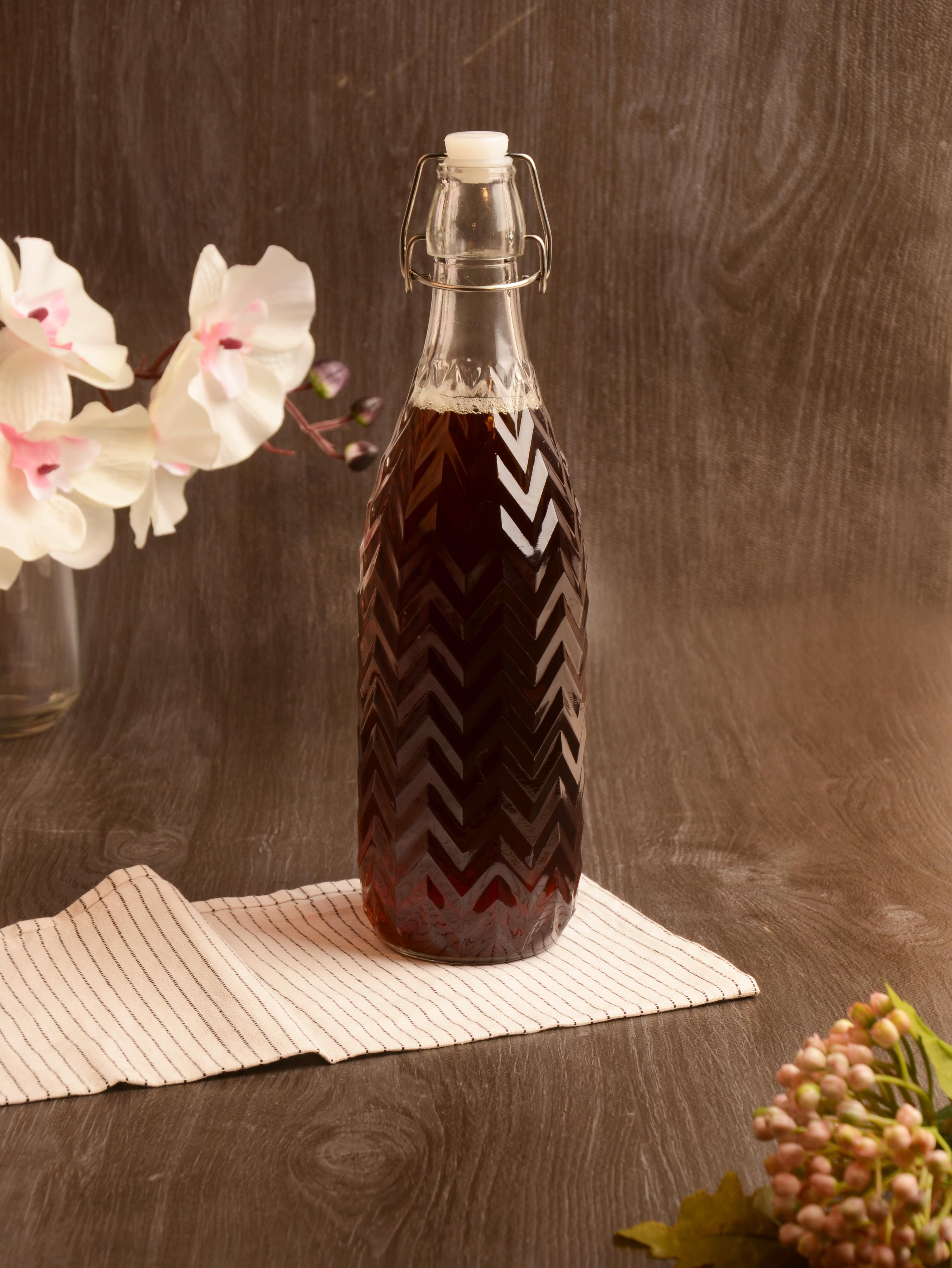 PAÇİ-KELEPÇELİ CAM ŞİŞE