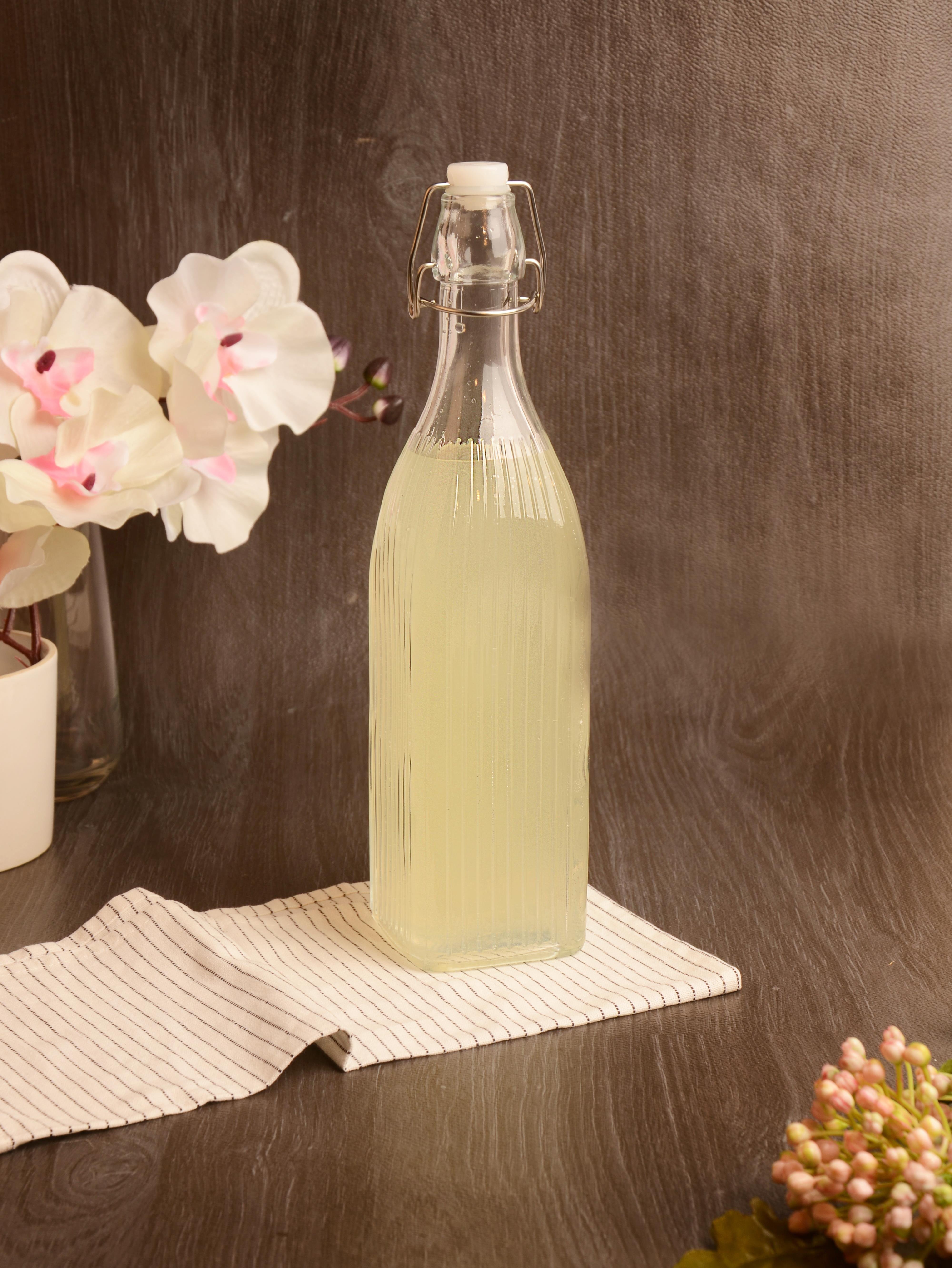 PAÇİ-KELEPÇELİ CAM ŞİŞE