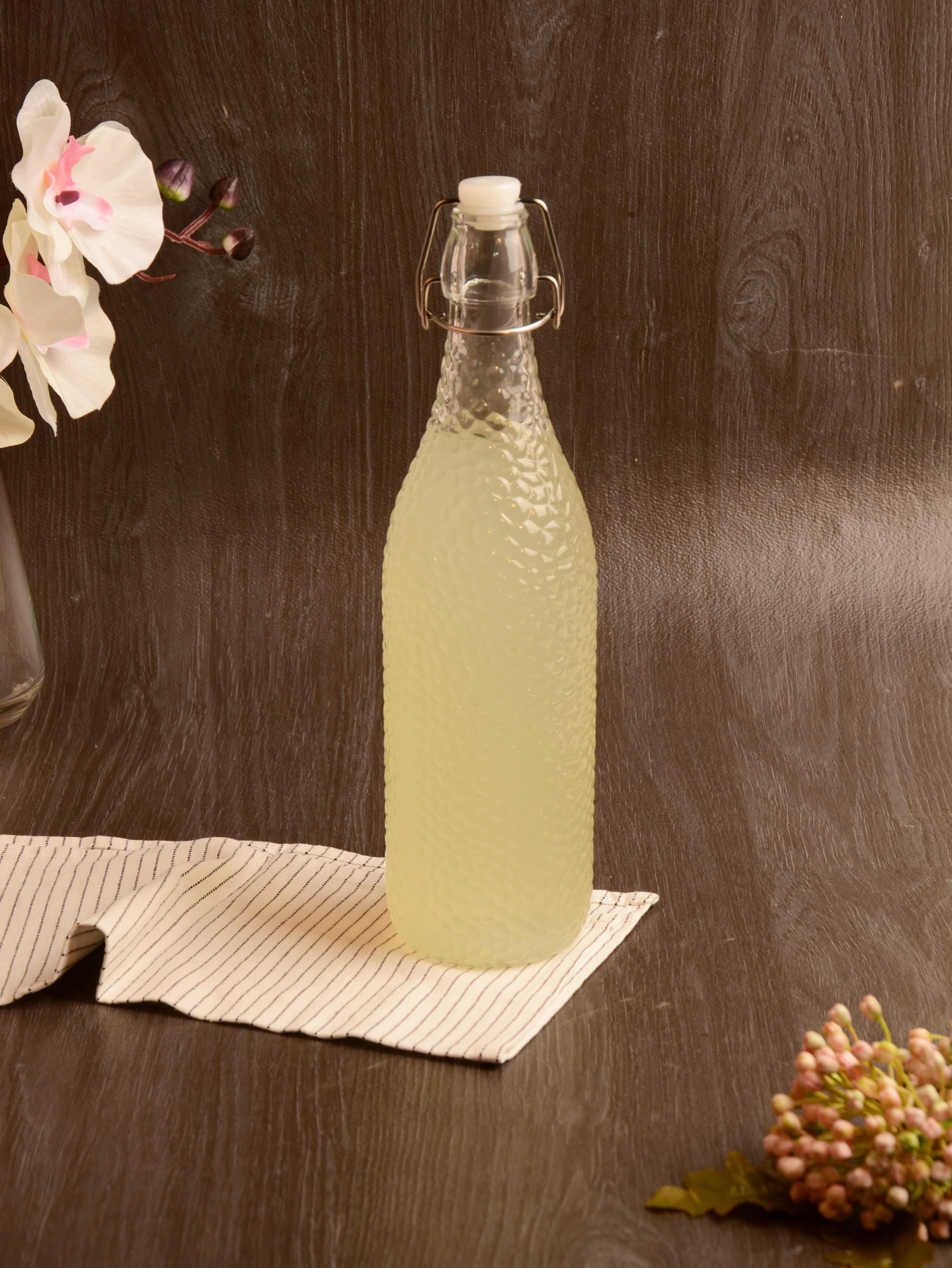 PAÇİ-KELEPÇELİ CAM ŞİŞE