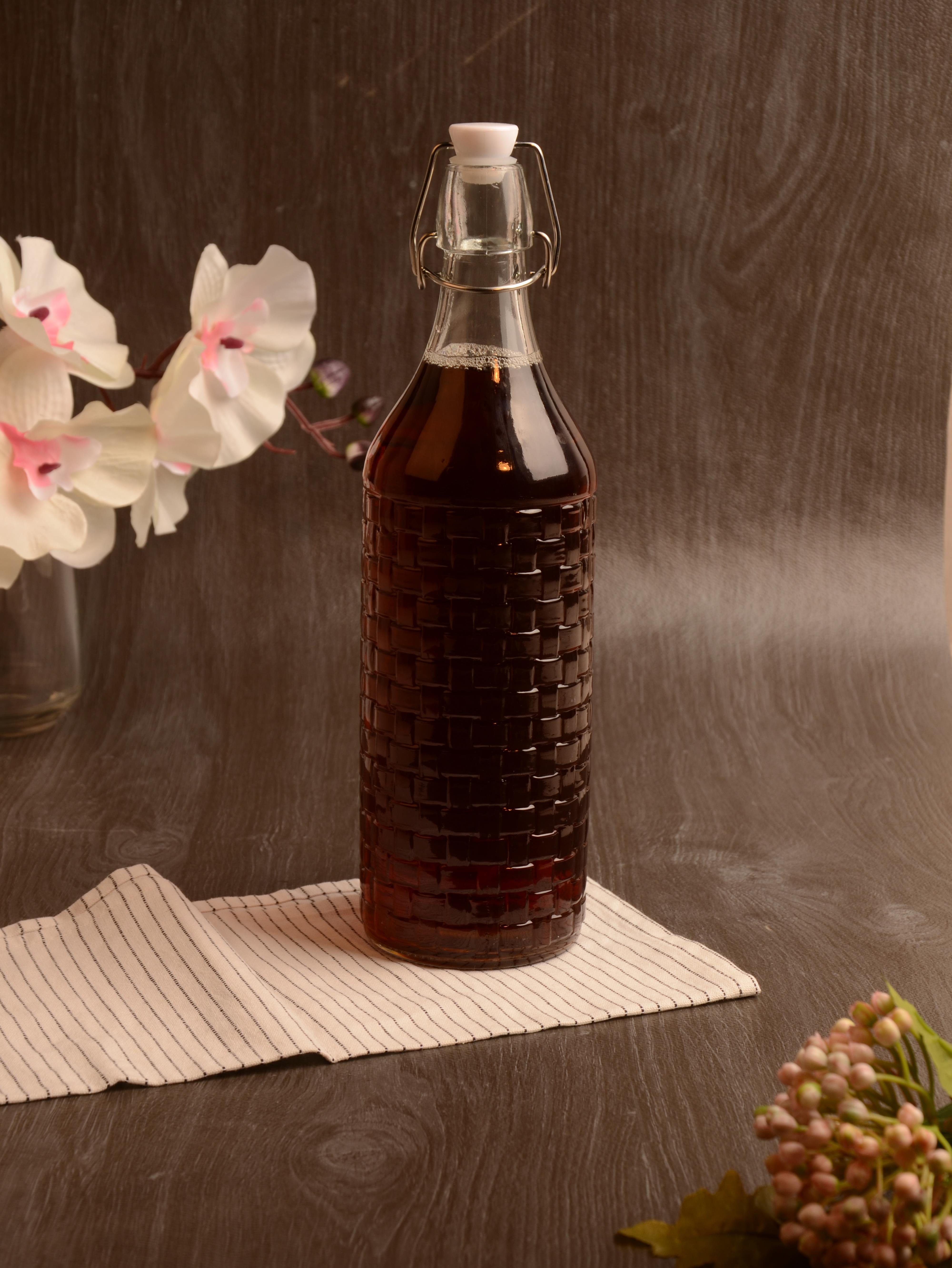 PAÇİ-KELEPÇELİ CAM ŞİŞE