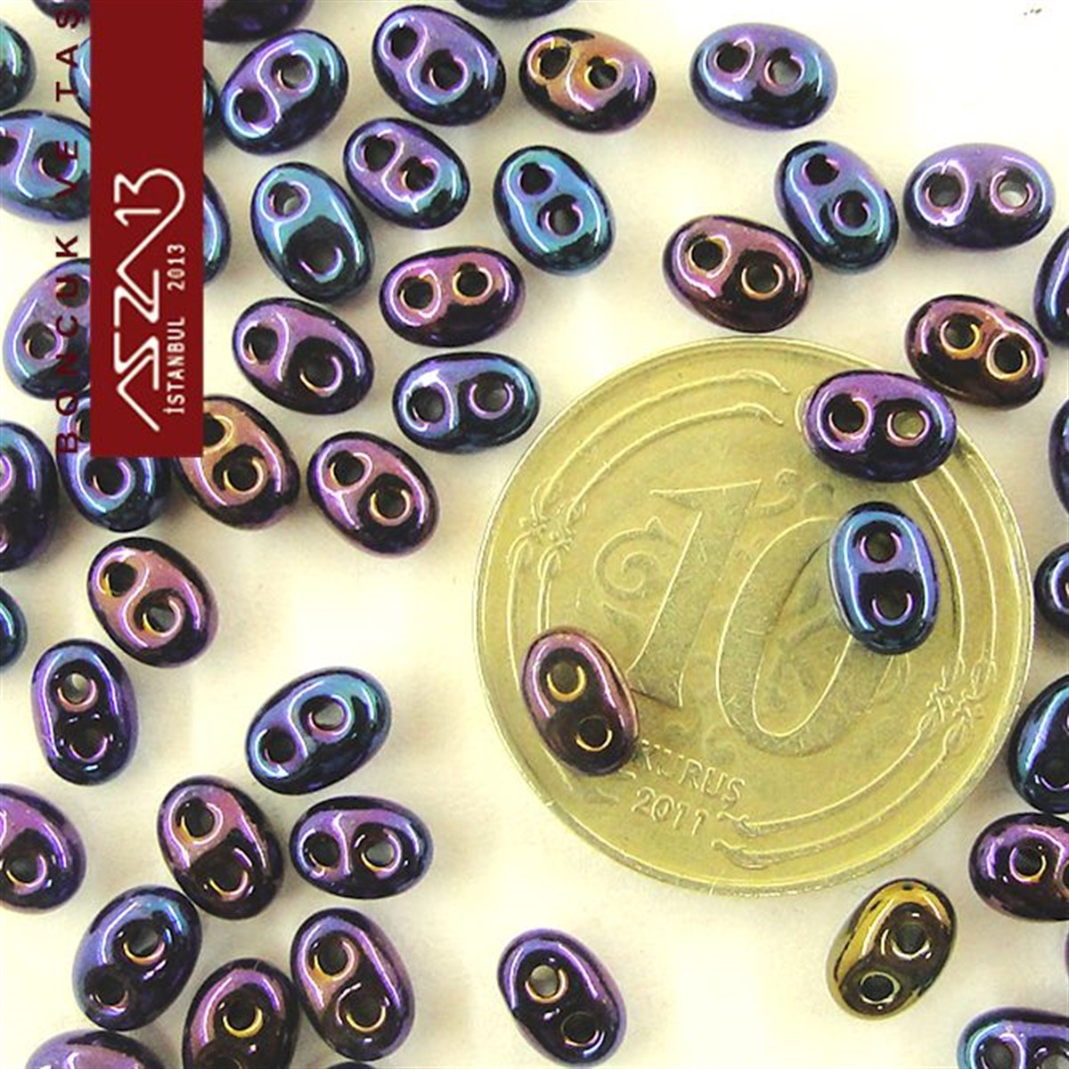 Cam Çift Delikli Twins BoncukBONCUK ve TAŞPreciosa65 Adet 2,5x5 mm Metalik Janjanlı Mavi-Mor Renkli Twin Cam Boncuk (3,8 gr)