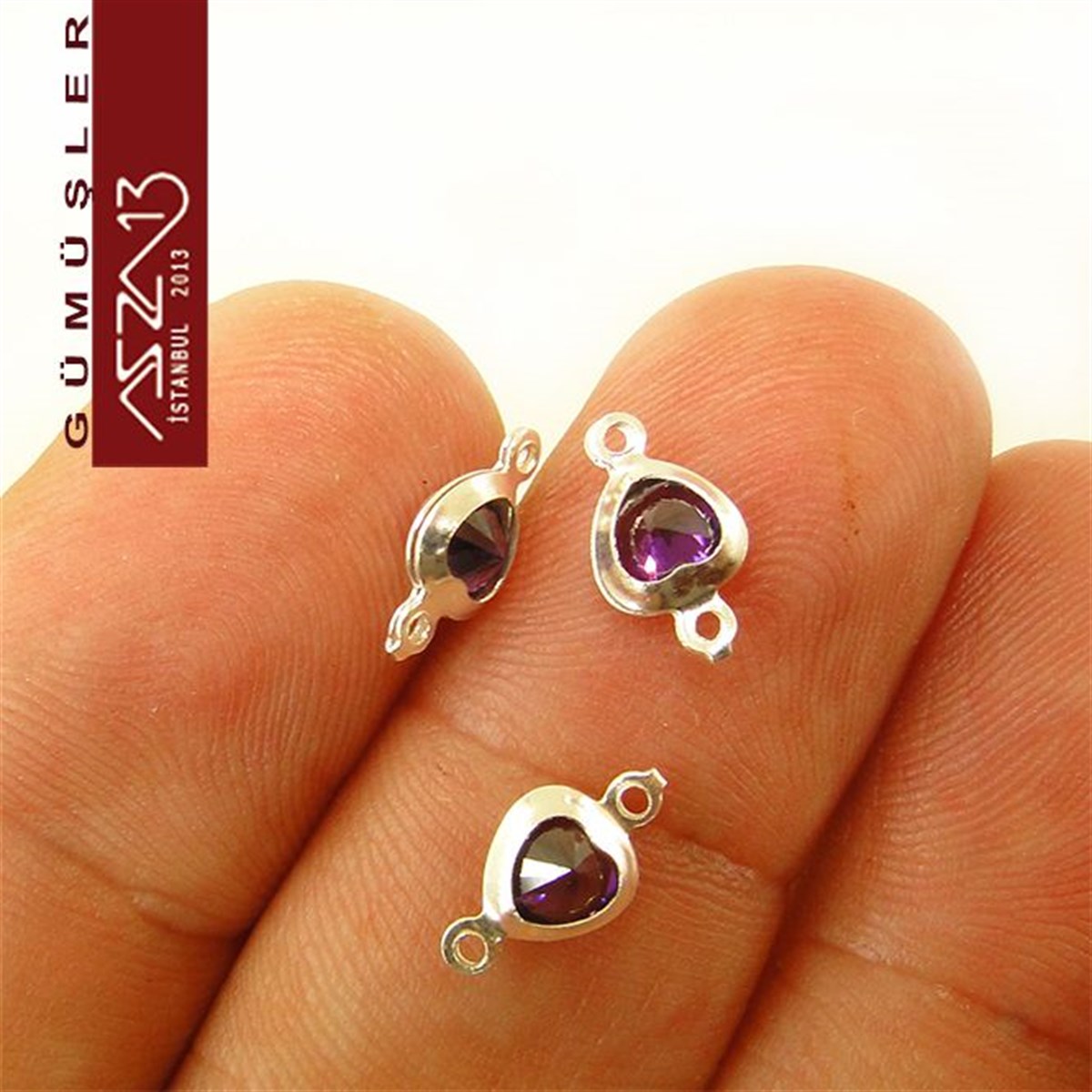 Gümüş Taşlı Döküm Ara MalzemelerGÜMÜŞMarkasız925 K Gümüş, Kalp, Amethyst Zirkon Taşlı, Çift Kulplu Ara Malzeme / Paket İçeriği 3 Adet