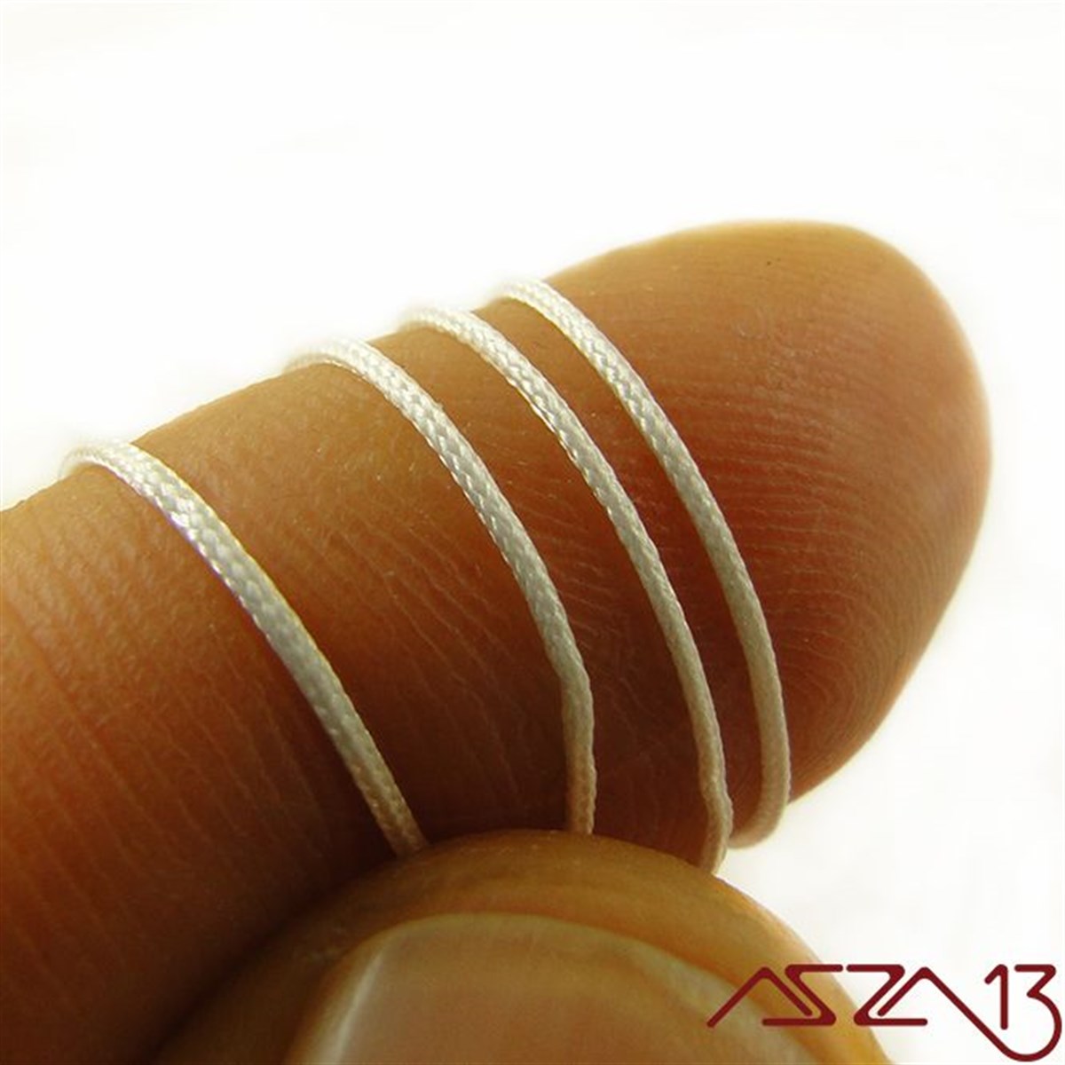 Tespih İpleriTAKI MALZEMEKord İplikBeyaz 0,6 mm Tespih İpi / Paket İçeriği 3 m